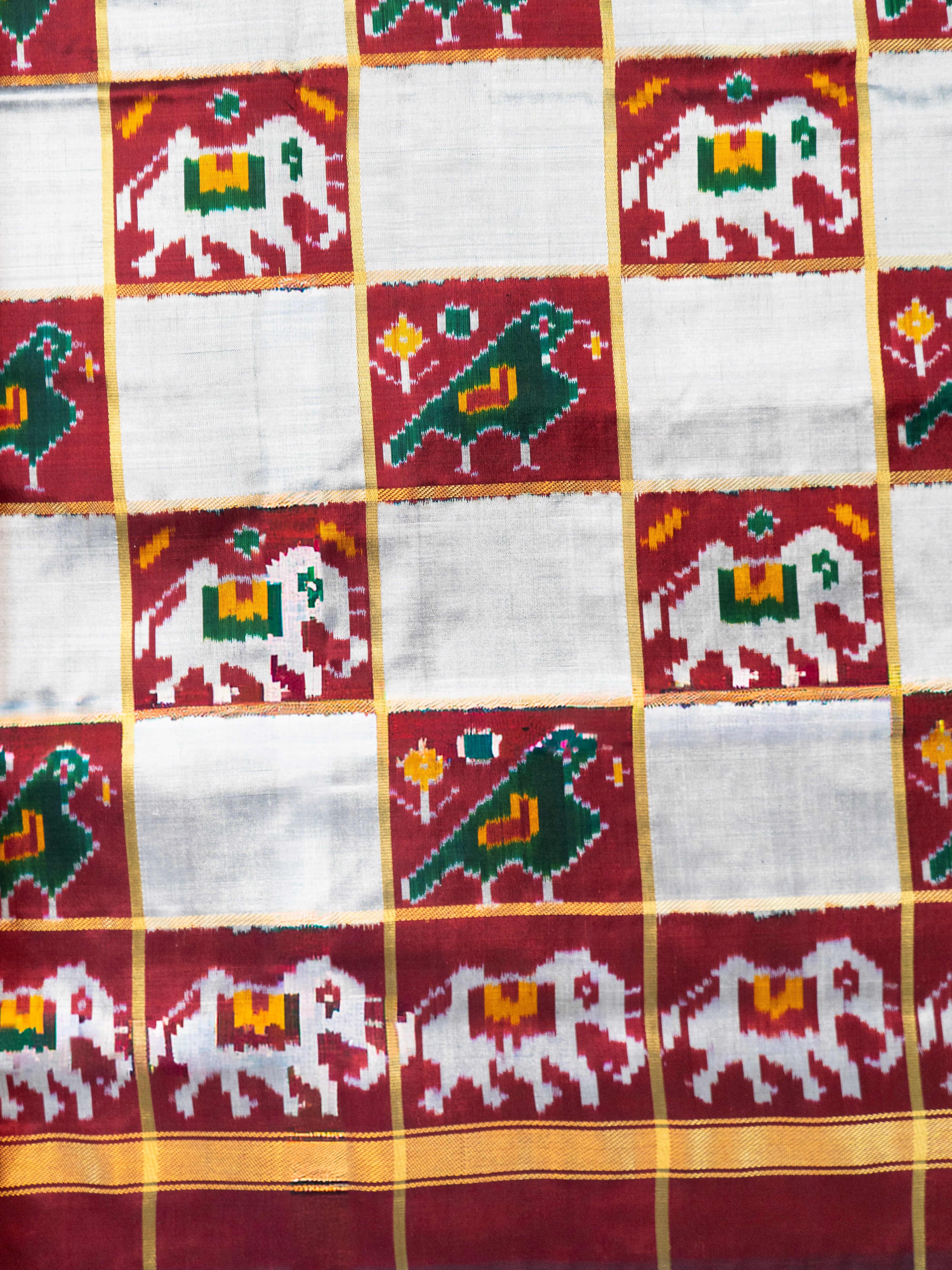 Pure Pochampally Double Ikat Silk Saree in Ghat Chola Checks with Elephant Ikat & Golden Zari