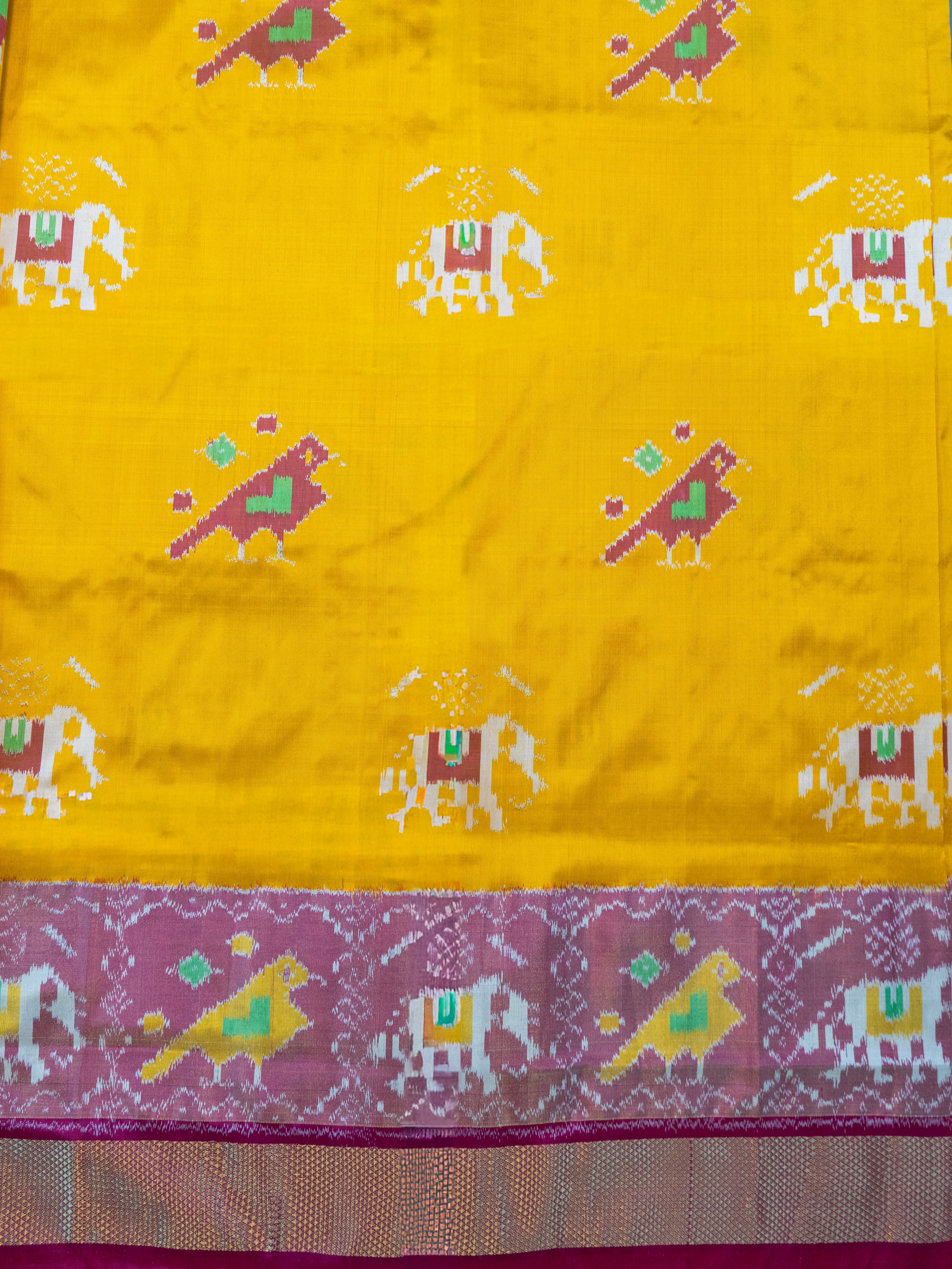 Pure Pochampally Double Ikat Silk Saree in Yellow with Elephant Ikat & Pink Pallu
