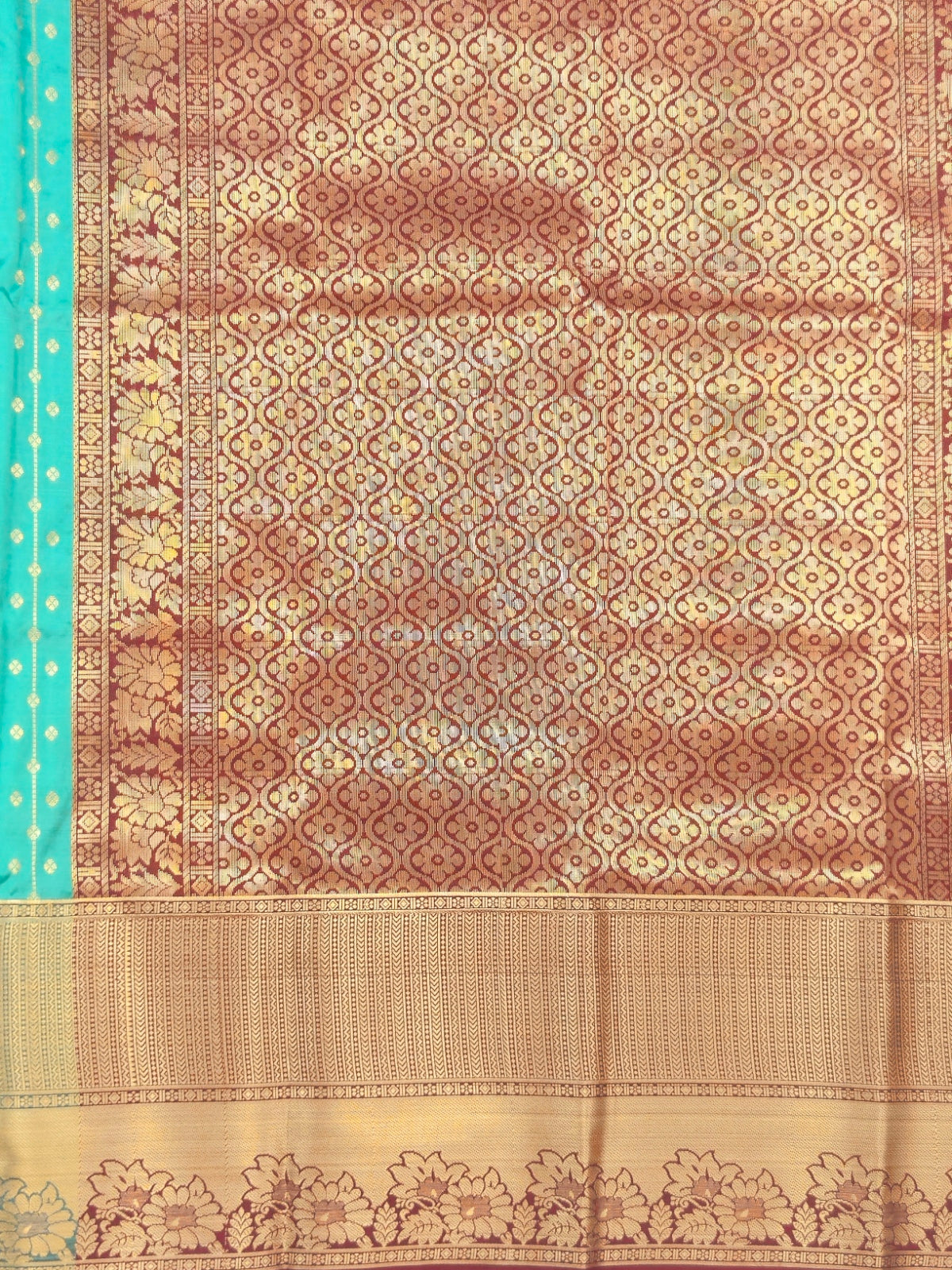 Kanchivaram golden line weaves saree in Blue-green color with geometric weaves
