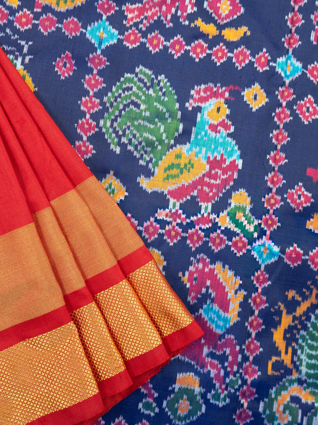 Pure Pochampally Double Ikat Silk Saree in Blue with Multicolor Ikat & Red Animal Pallu
