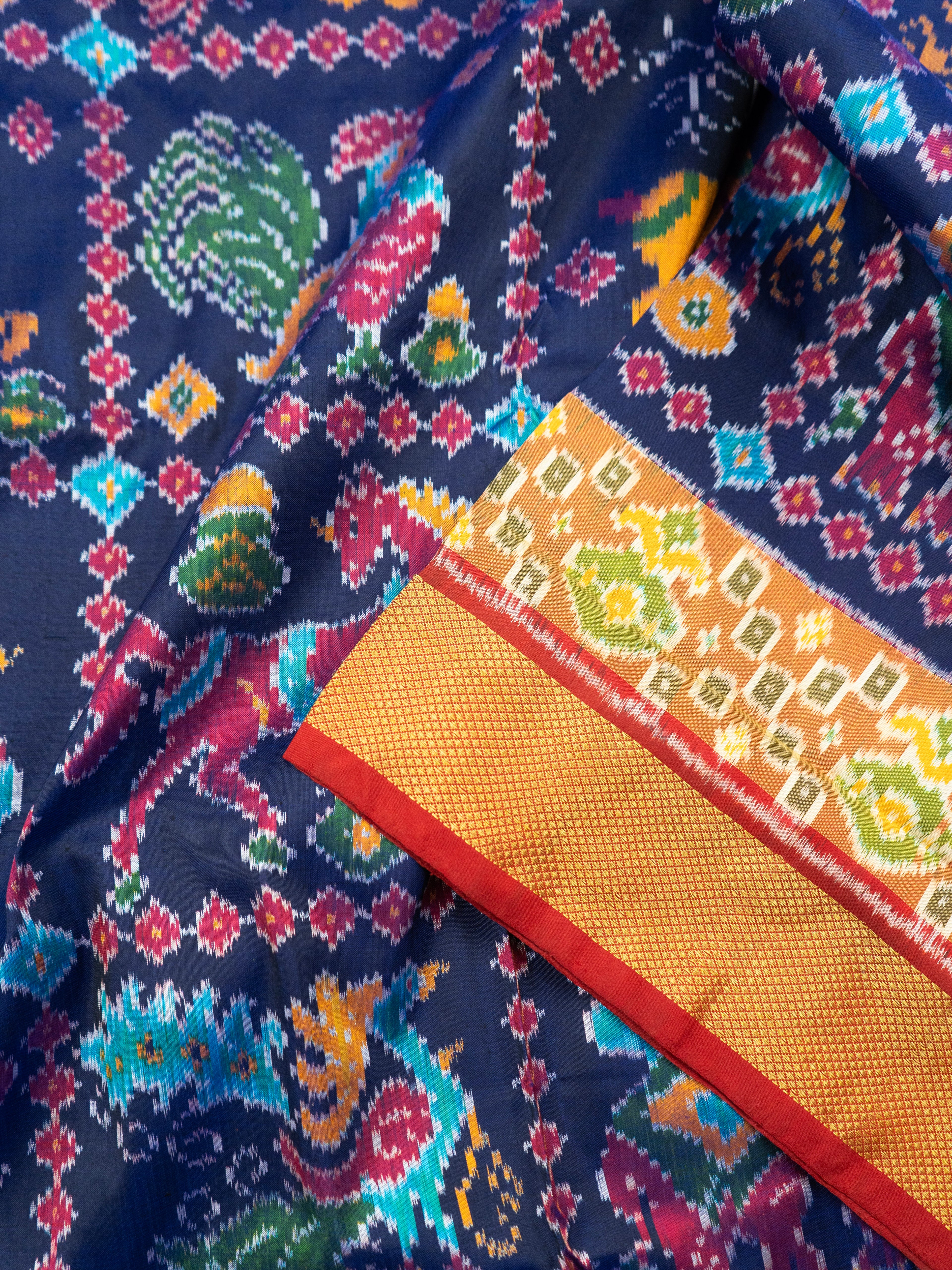 Pure Pochampally Double Ikat Silk Saree in Blue with Multicolor Ikat & Red Animal Pallu