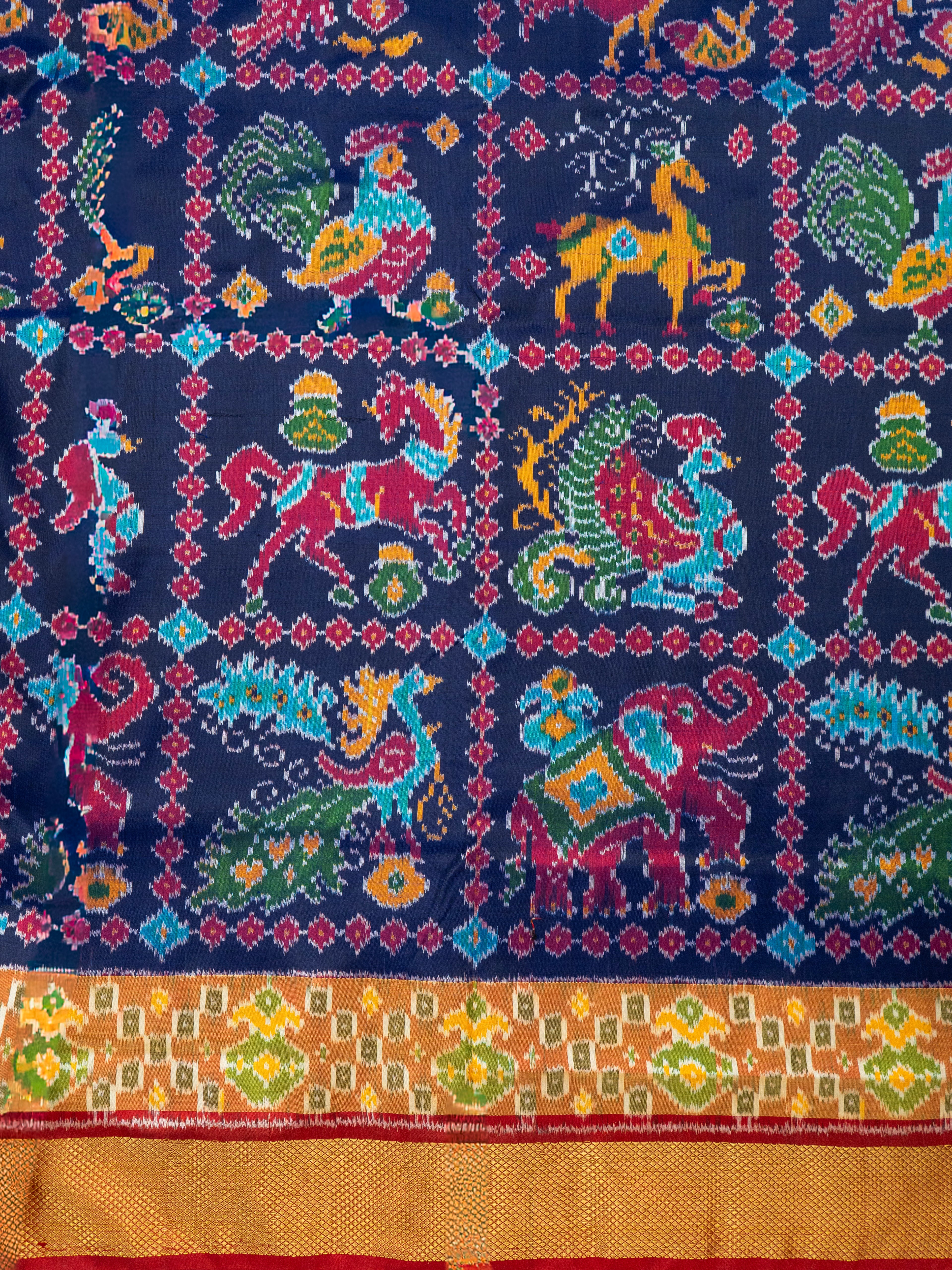 Pure Pochampally Double Ikat Silk Saree in Blue with Multicolor Ikat & Red Animal Pallu