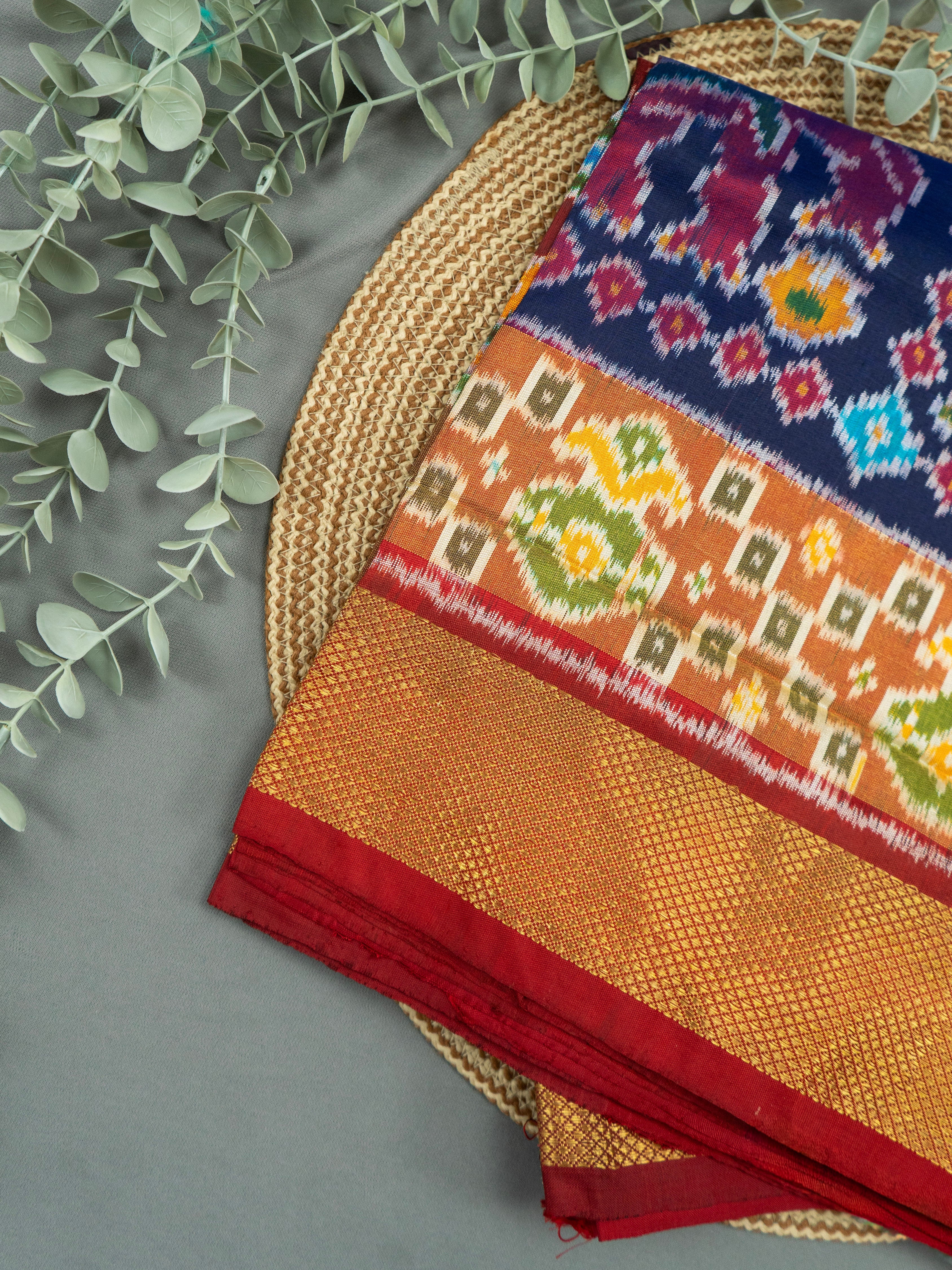 Pure Pochampally Double Ikat Silk Saree in Blue with Multicolor Ikat & Red Animal Pallu