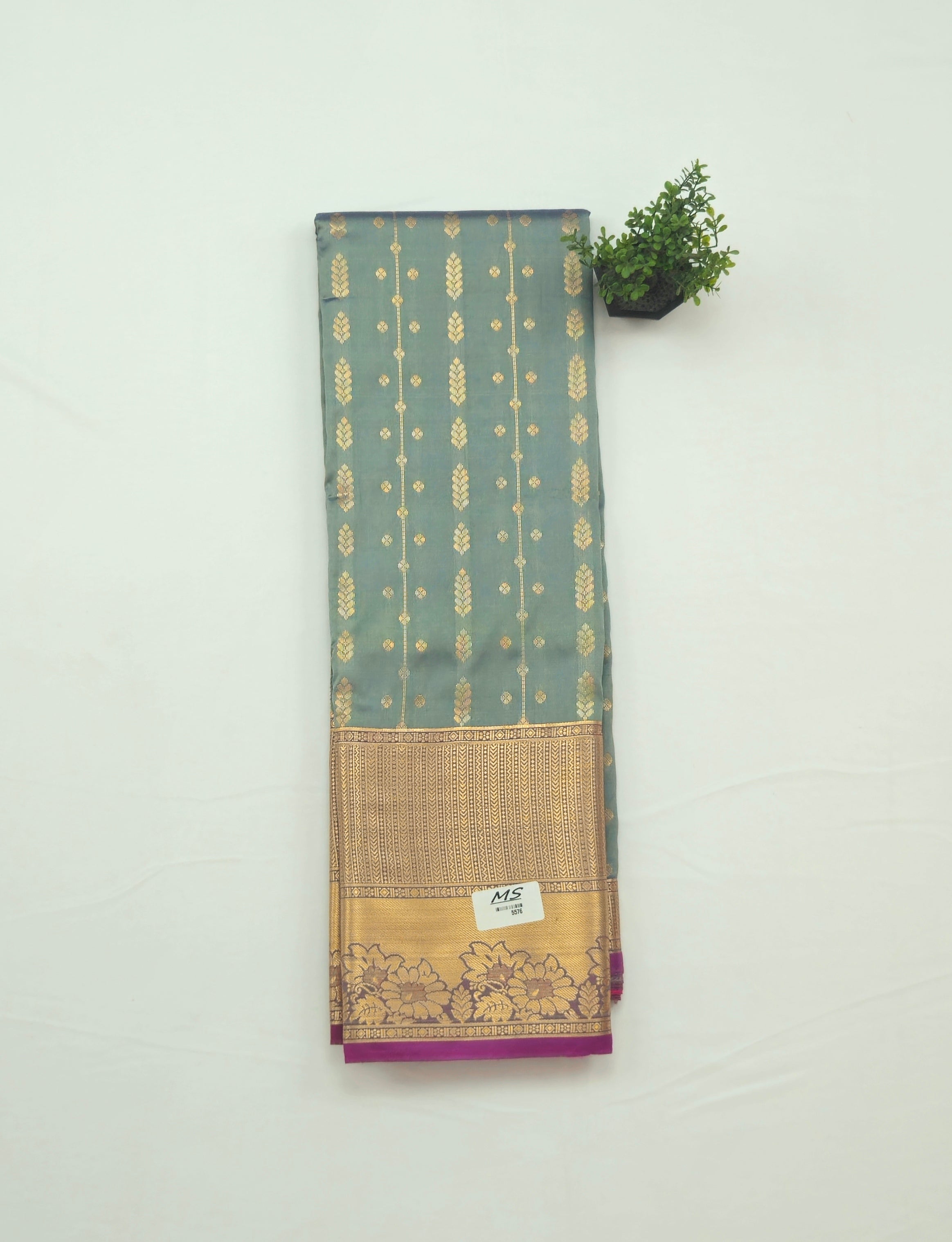 Kanchivaram golden line weaves saree in grey color with geometric weaves