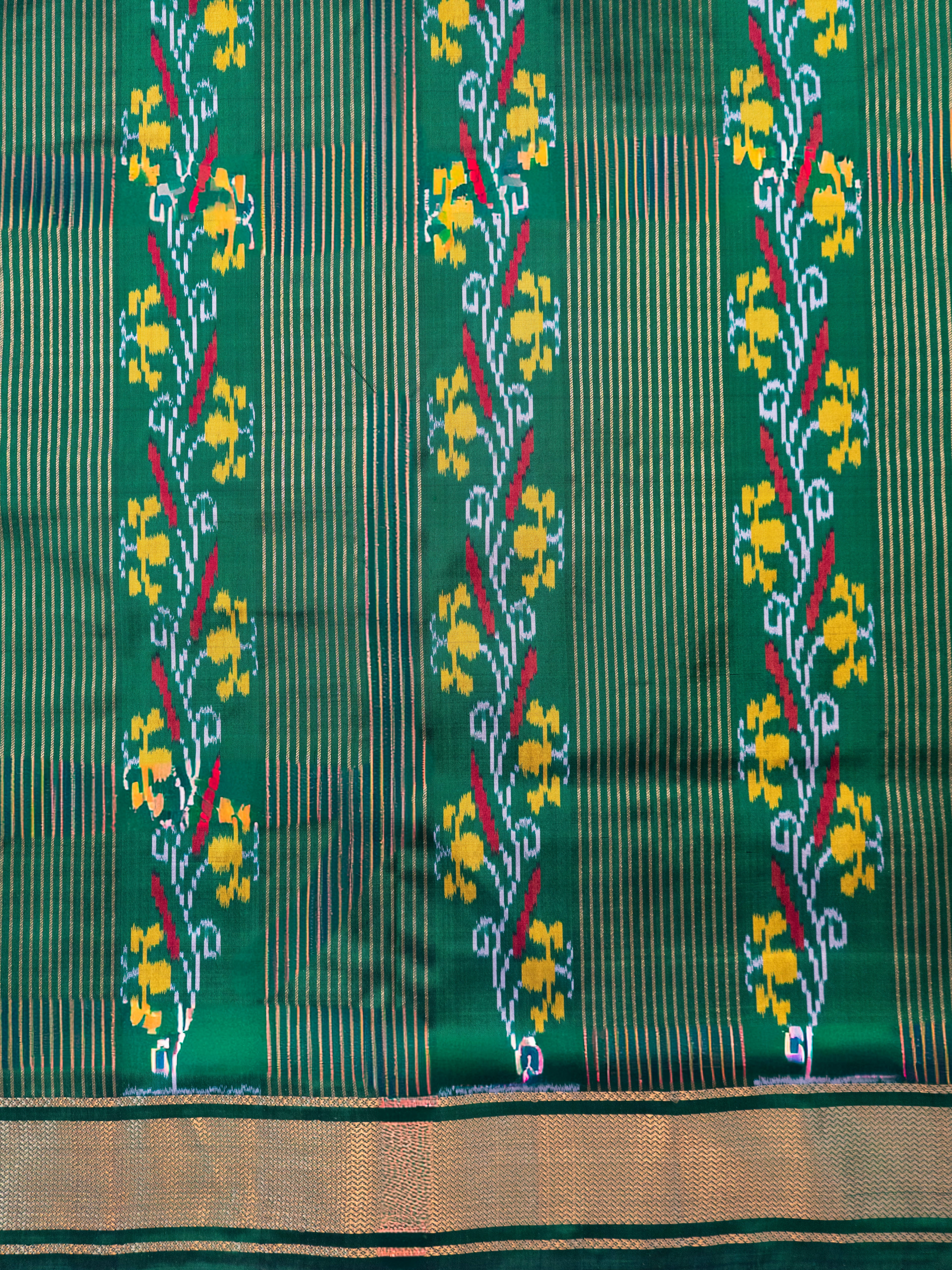 Pure Pochampally Silk Saree in Deep Bottle Green with Ikat & Zari Weaving