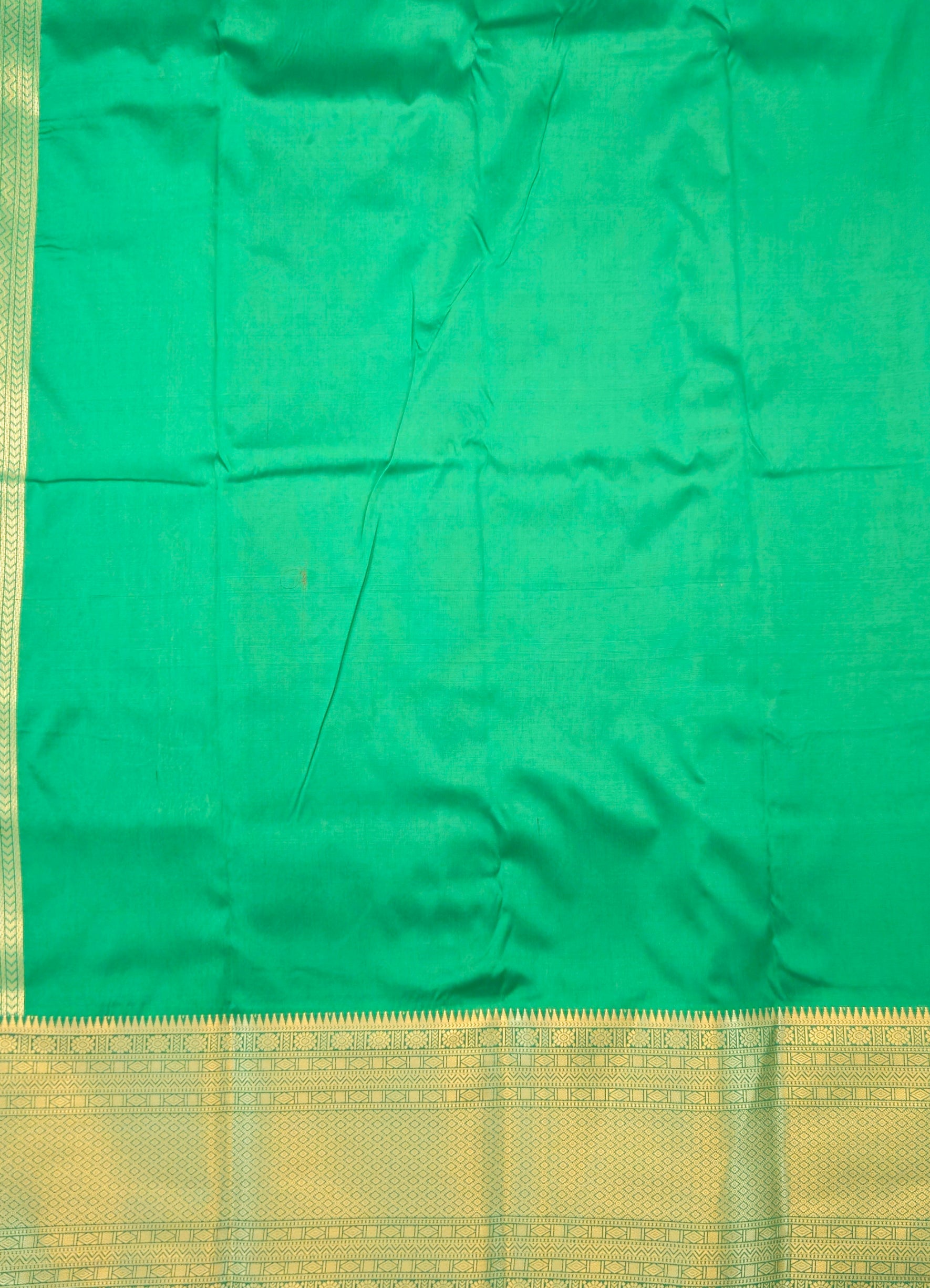 Kanchivaram golden line weaves saree in deep brown color with geometric weaves