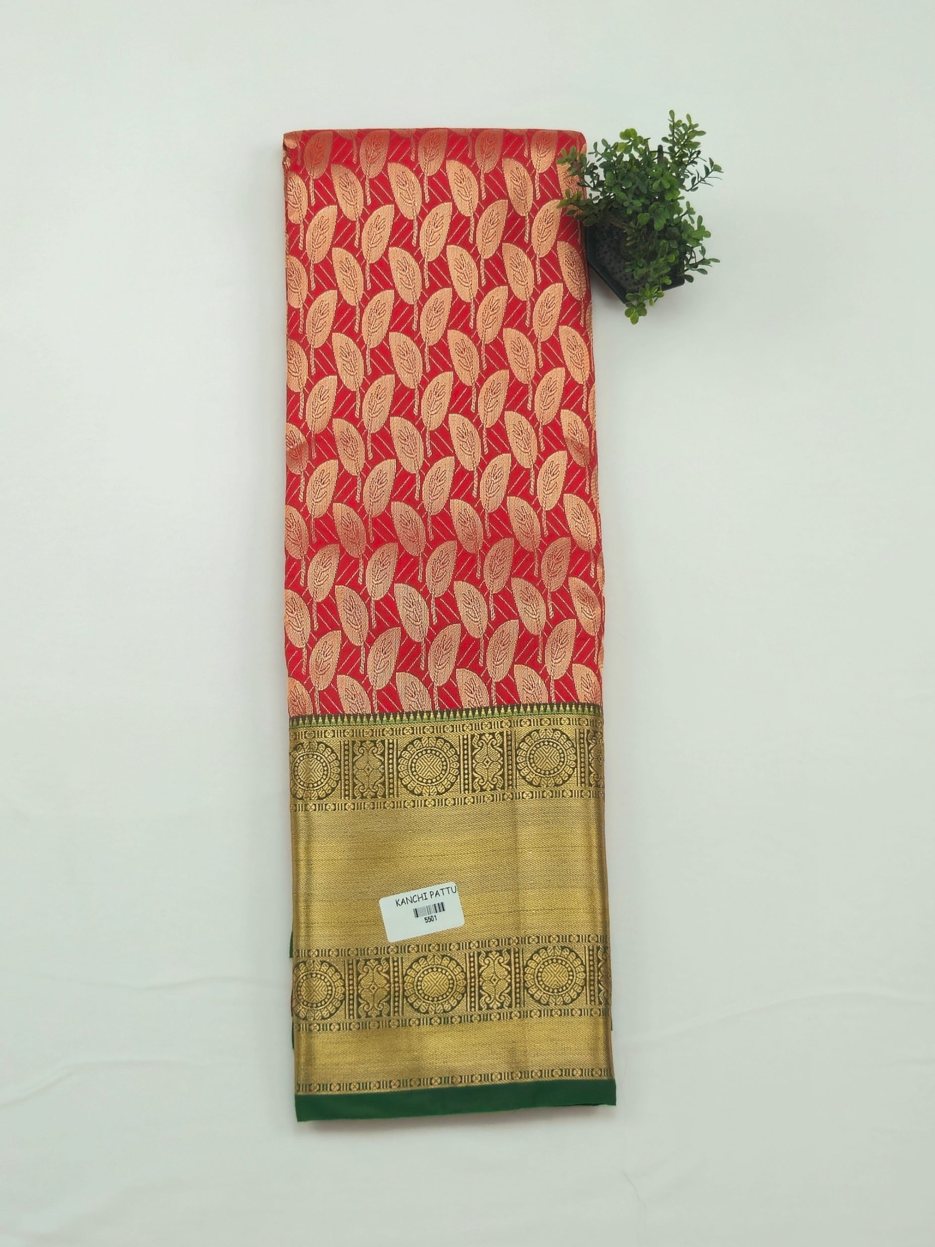 Kanchivaram golden leaf weave saree in red color with pattu border