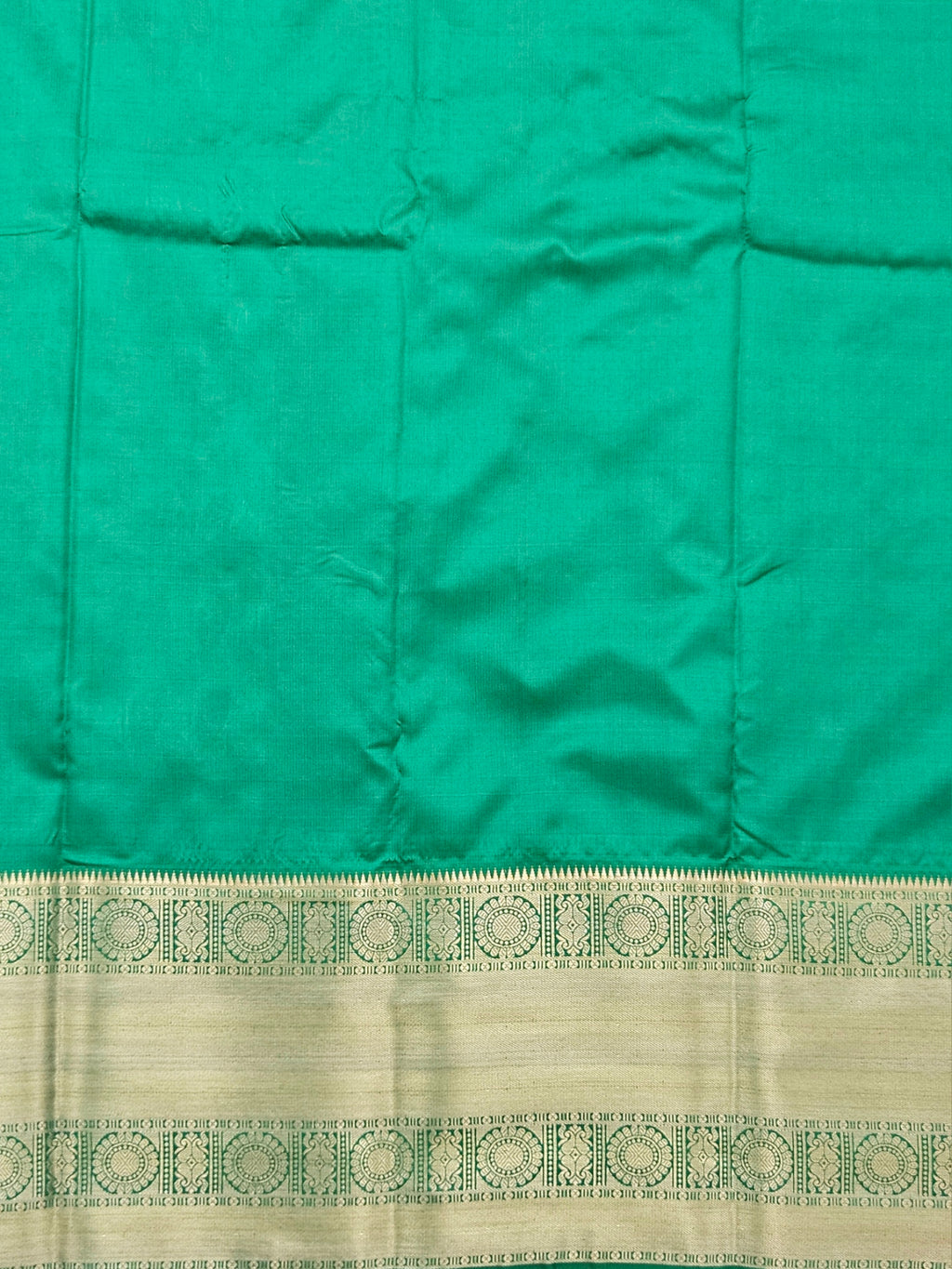 Kanchivaram golden leaf weave saree in red color with pattu border