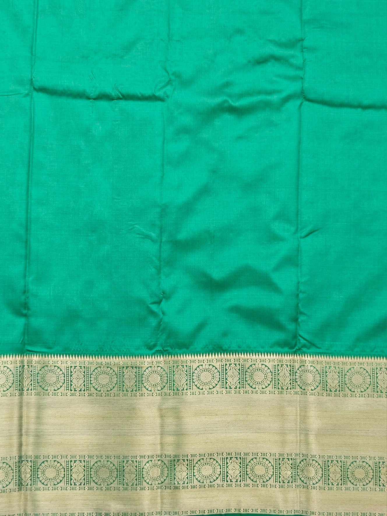 Kanchivaram golden leaf weave saree in red color with pattu border