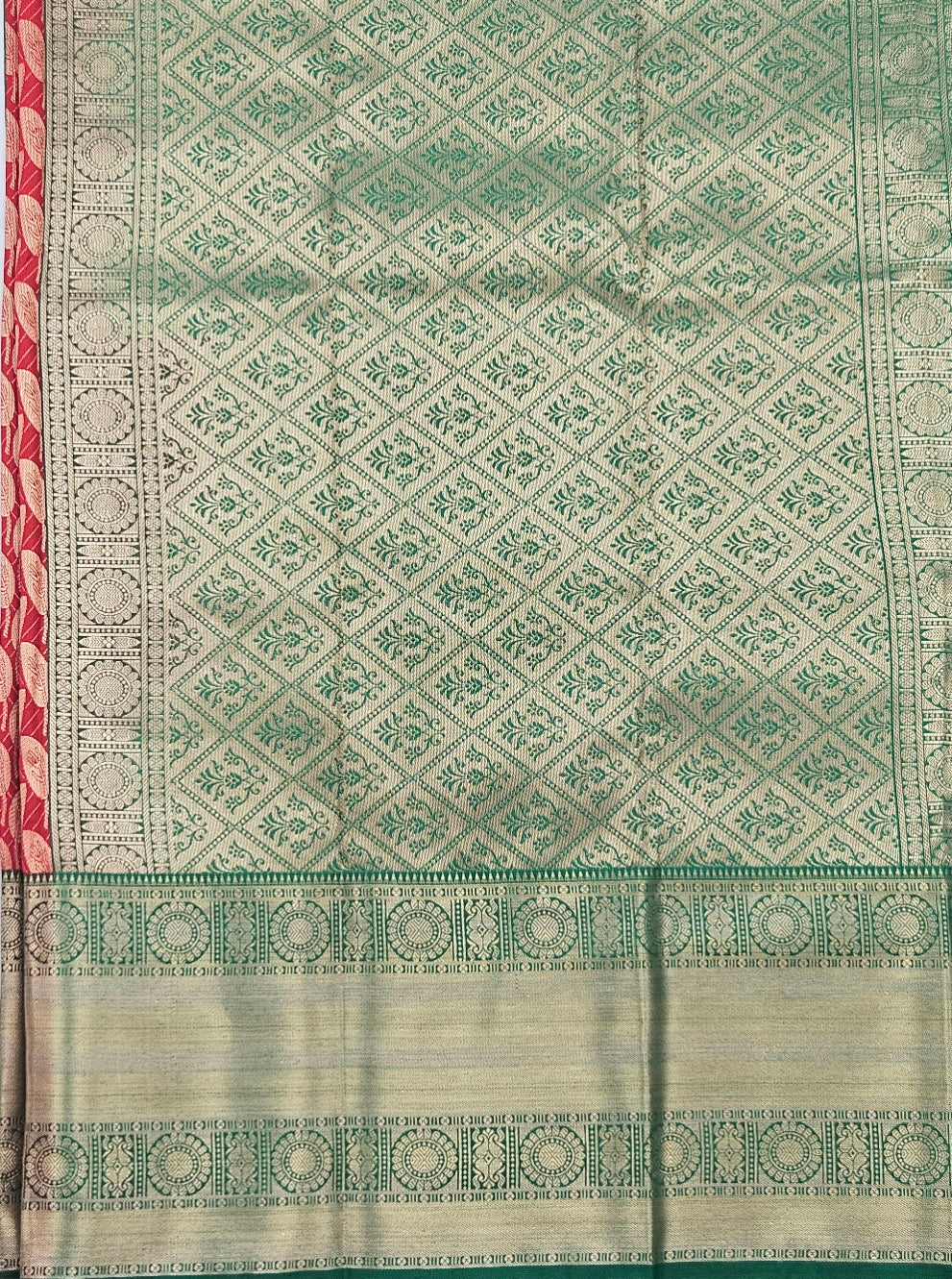 Kanchivaram golden leaf weave saree in red color with pattu border