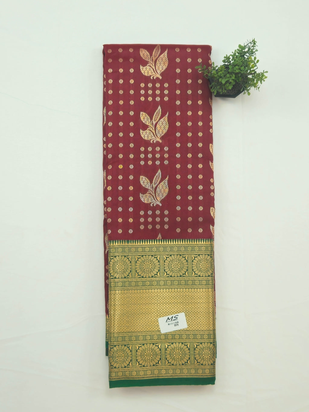 Kanchivaram golden weave saree in brown color with geometric weaves