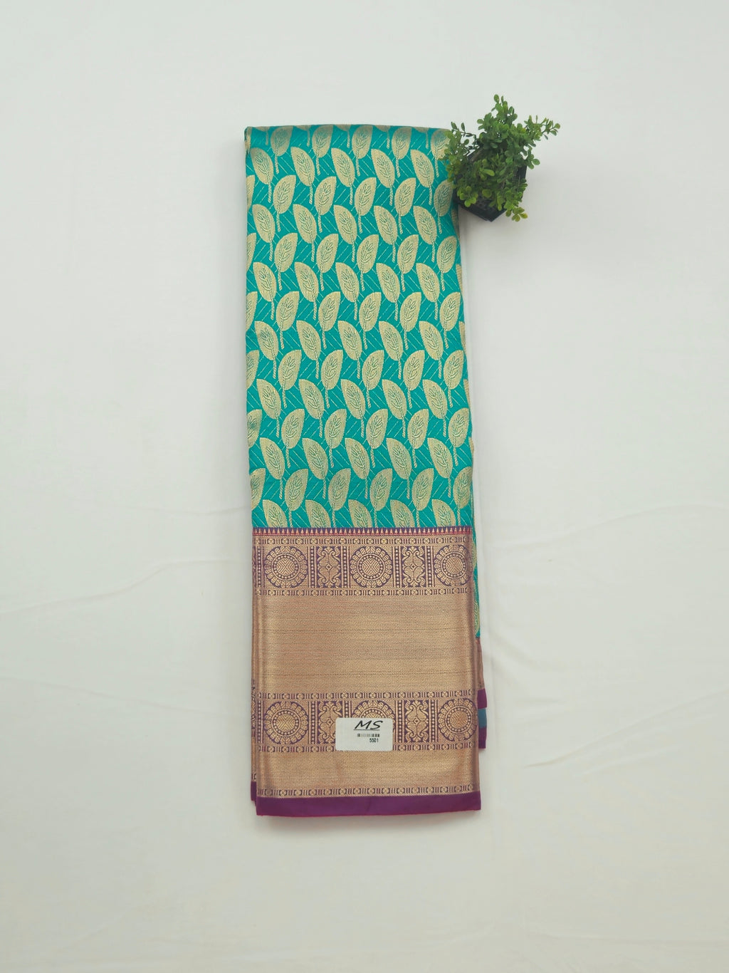 Kanchivaram golden leaf weave saree in Algae color with pattu border