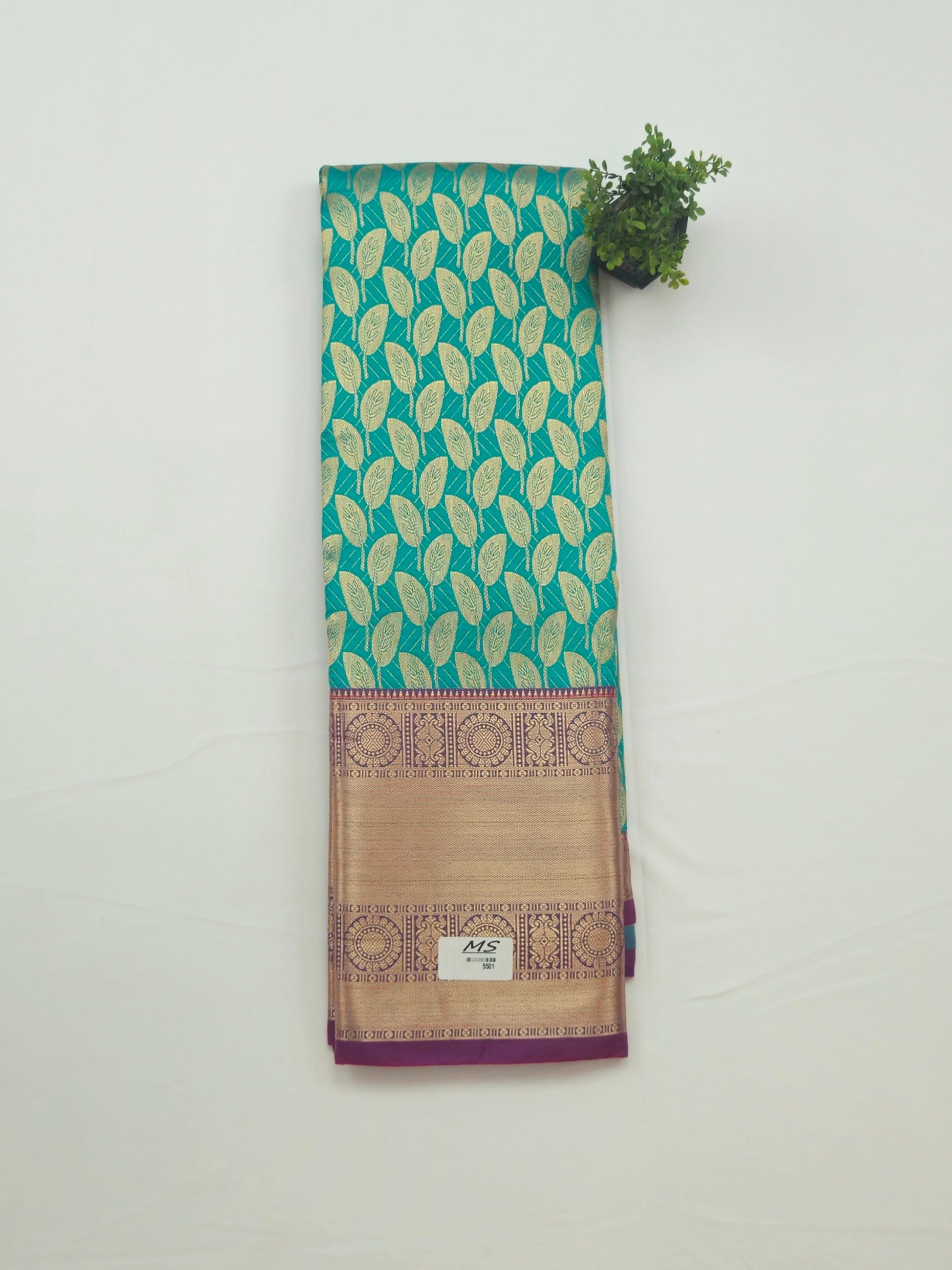 Kanchivaram golden leaf weave saree in Algae color with pattu border