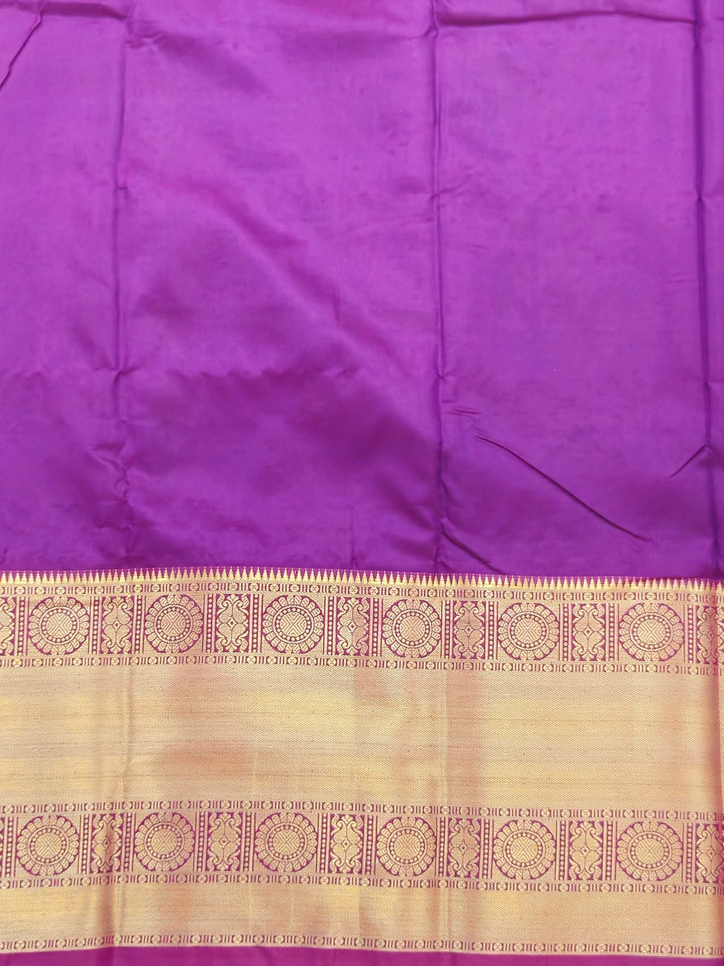 Kanchivaram golden leaf weave saree in Algae color with pattu border