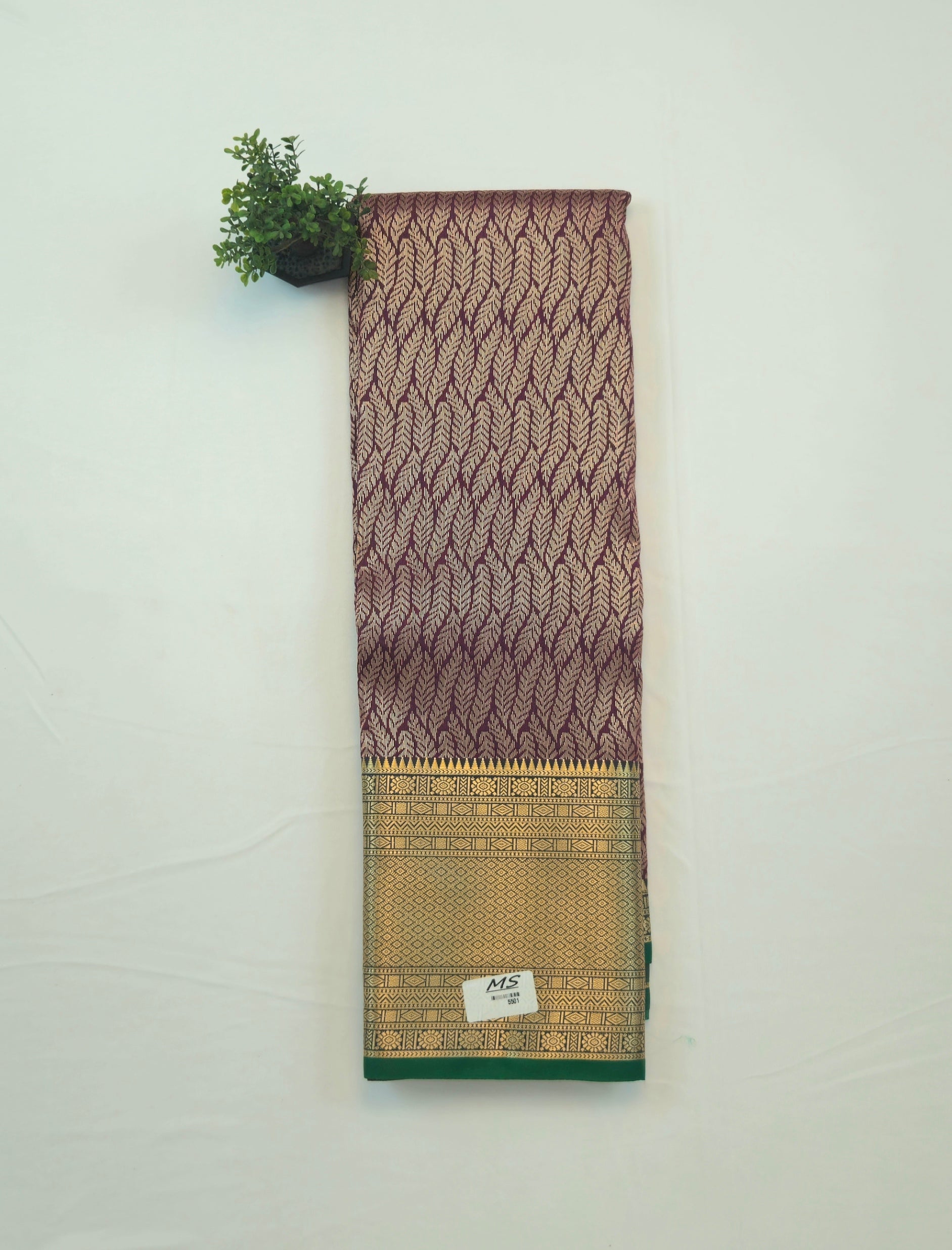 Kanchivaram golden line weaves saree in deep brown color with geometric weaves