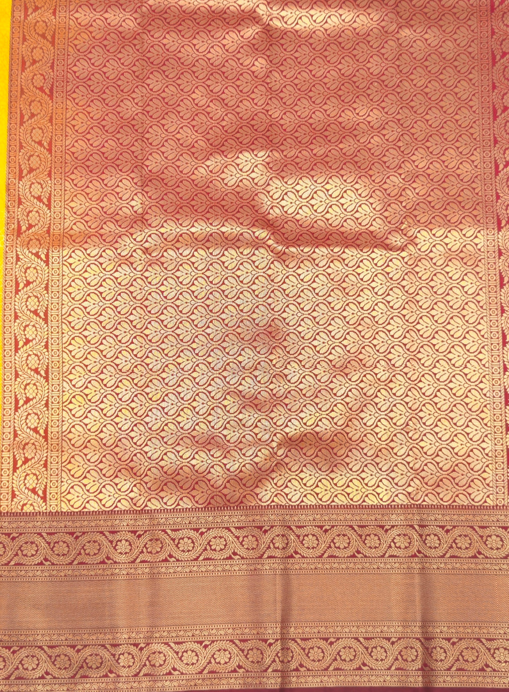 Kanchivaram golden line weaves saree in yellow color with geometric weaves