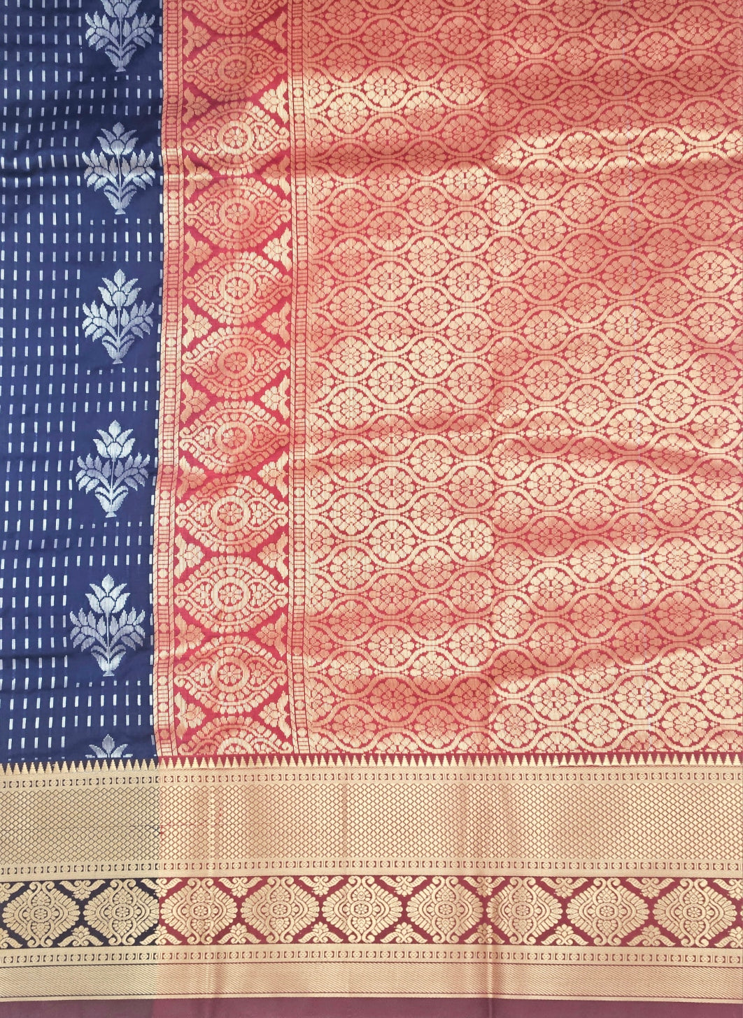 Kanchivaram silver line weaves saree in blue color with geometric weaves and contrast blouse