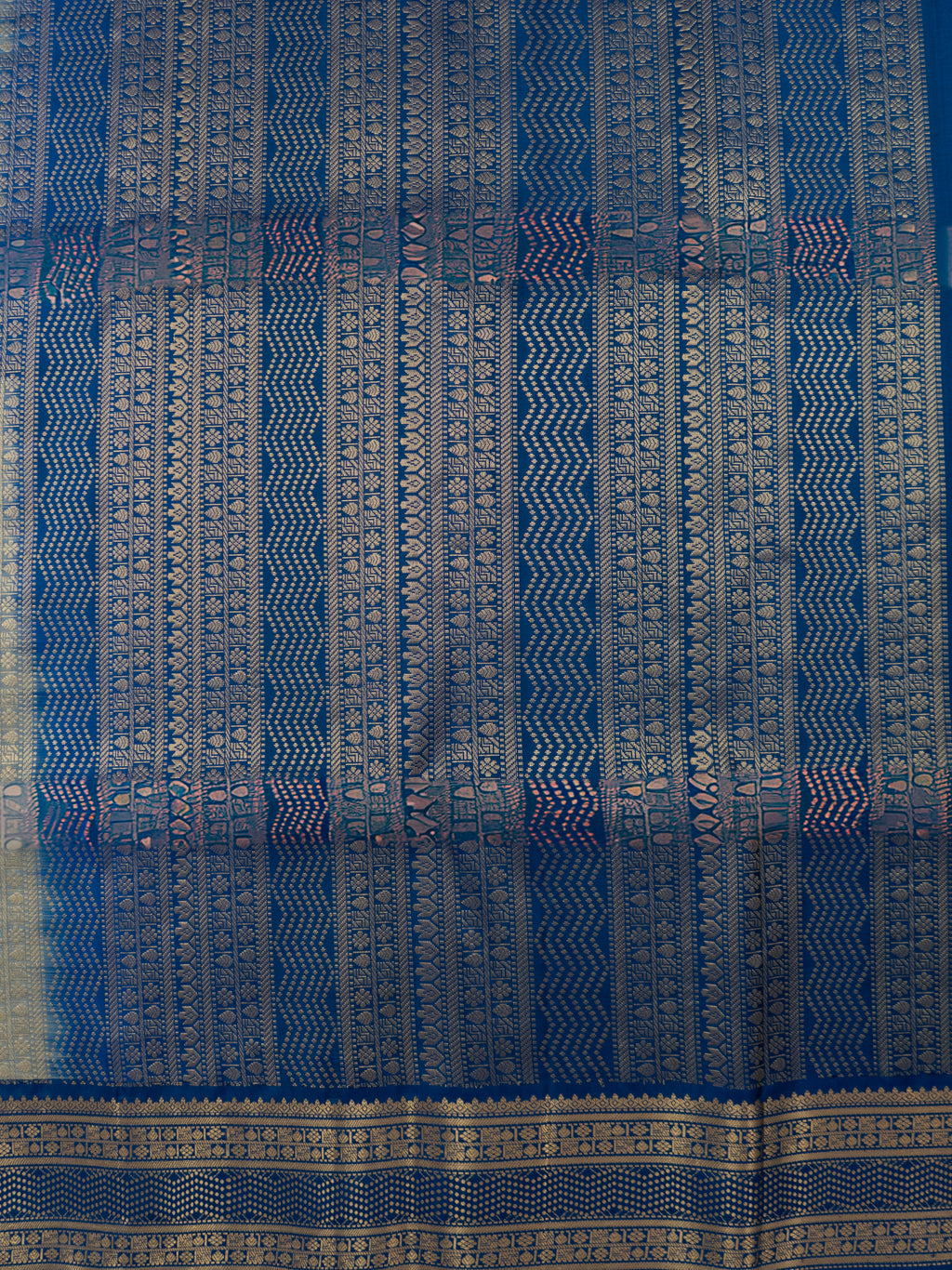 Pure Pochampally Double Ikat Silk Saree in White with Blue Ikat Pallu & Gold Zari Border