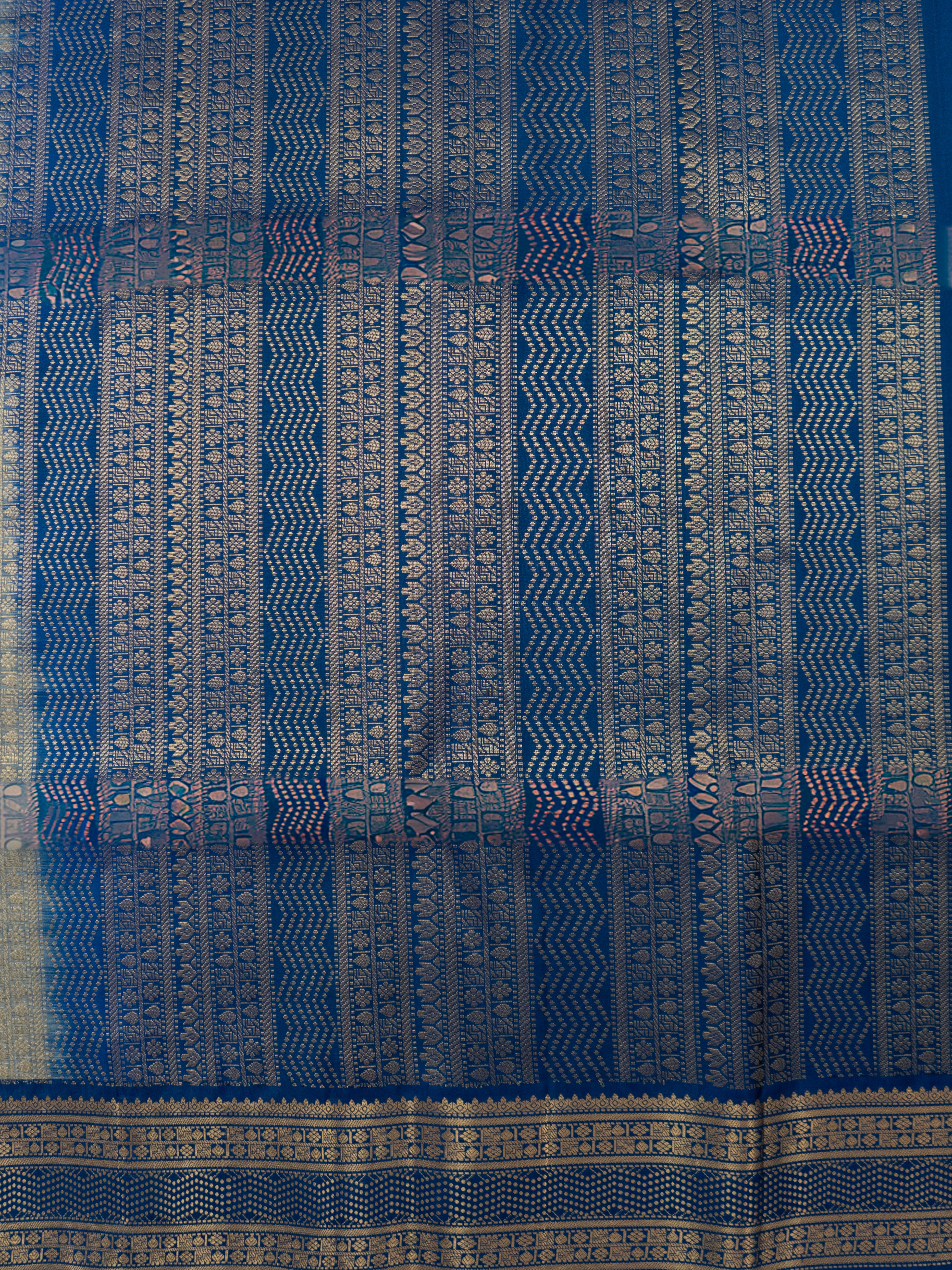 Pure Pochampally Double Ikat Silk Saree in White with Blue Ikat Pallu & Gold Zari Border