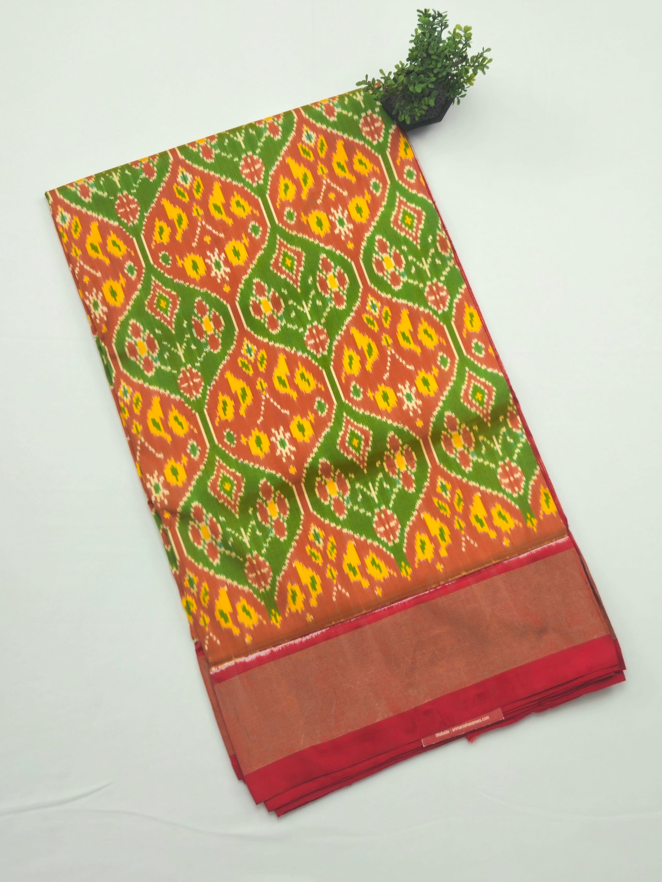 Pure Pochampally silk saree in Green double ikkat with designer pallu and contrast Blouse