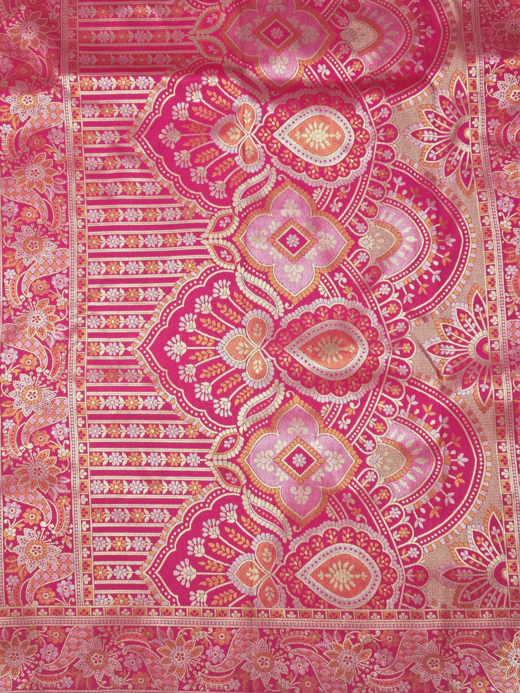 Kanchivaram heavy weaves saree in orange color with contrast weaved pink blouse