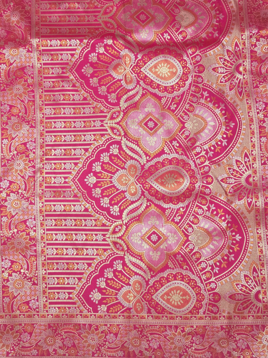 Kanchivaram heavy weaves saree in orange color with contrast weaved pink blouse