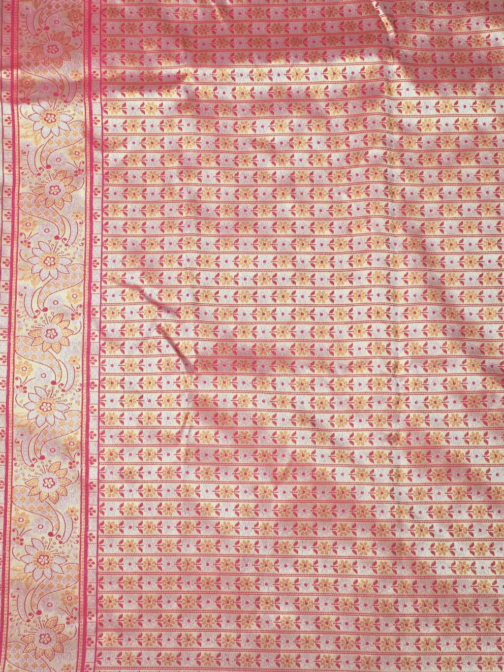 Kanchivaram heavy weaves saree in orange color with contrast weaved pink blouse