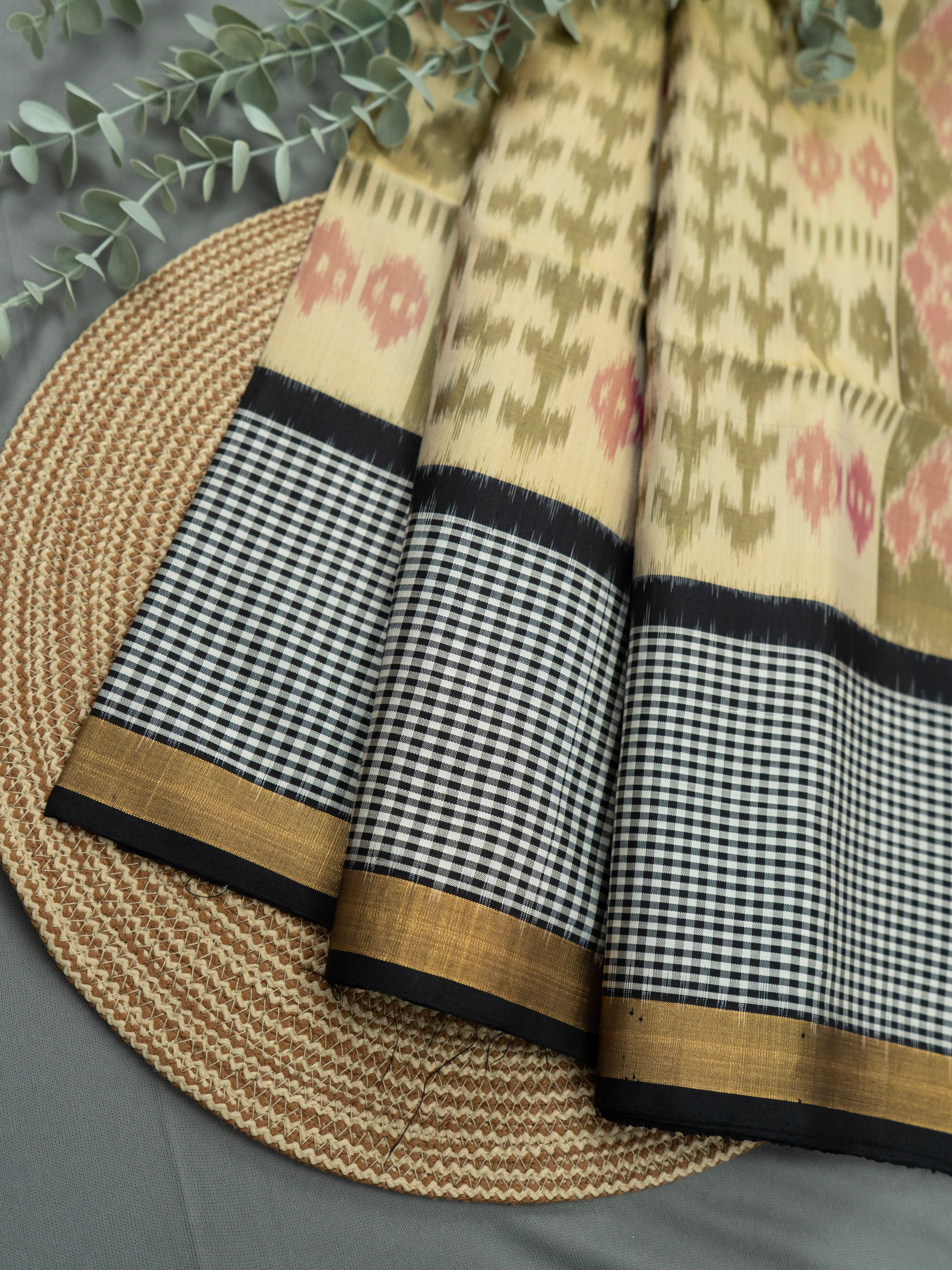 Pure Pochampally Double Ikat Silk Saree in Cream Beige with Multicolour Ikat pattern on Black Pallu