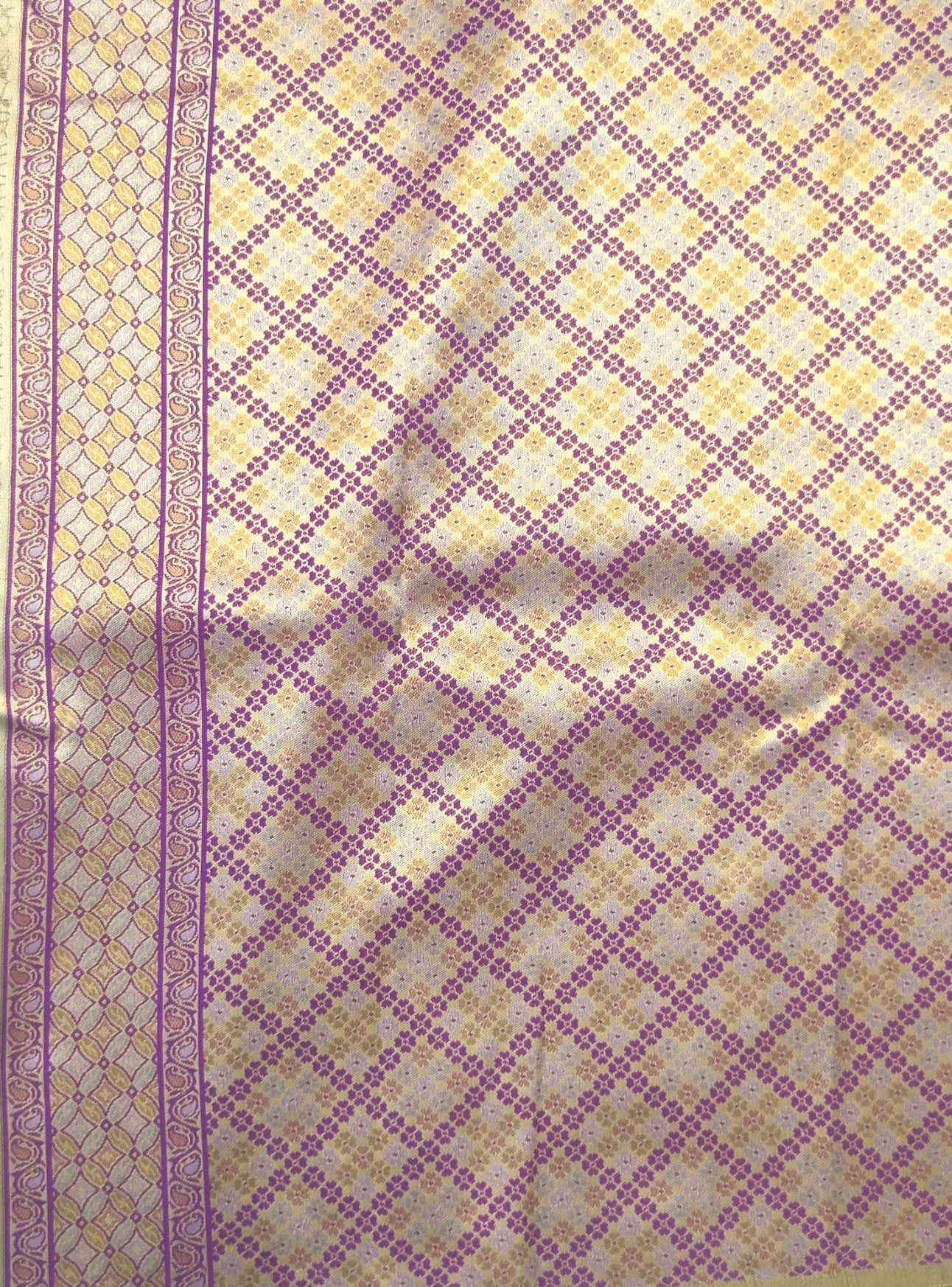 Kanchivaram heavy weaving  saree in olive green color with contrast geometric blouse