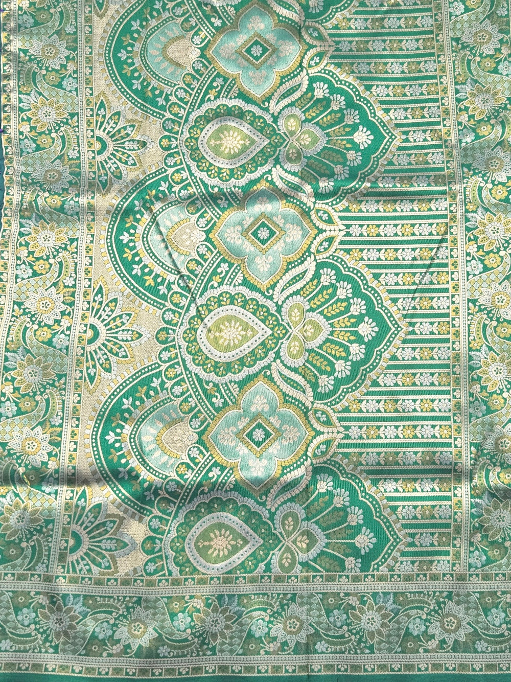 Kanchivaram heavy weaving  brocrade saree in lavender color with contrast geometric blouse