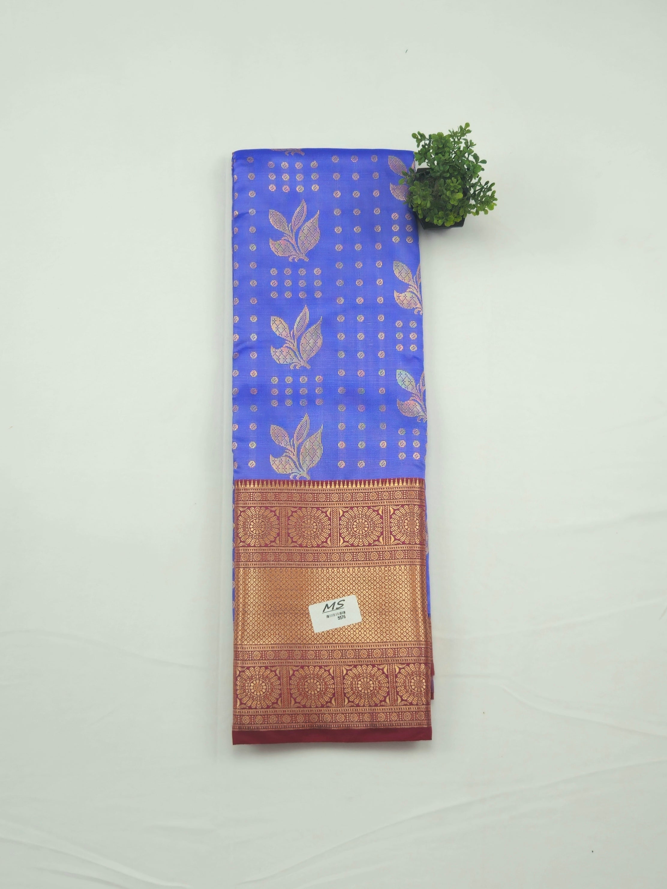 Kanchivaram Geometric weaving  brocrade saree in lavender color with contrast geometric blouse