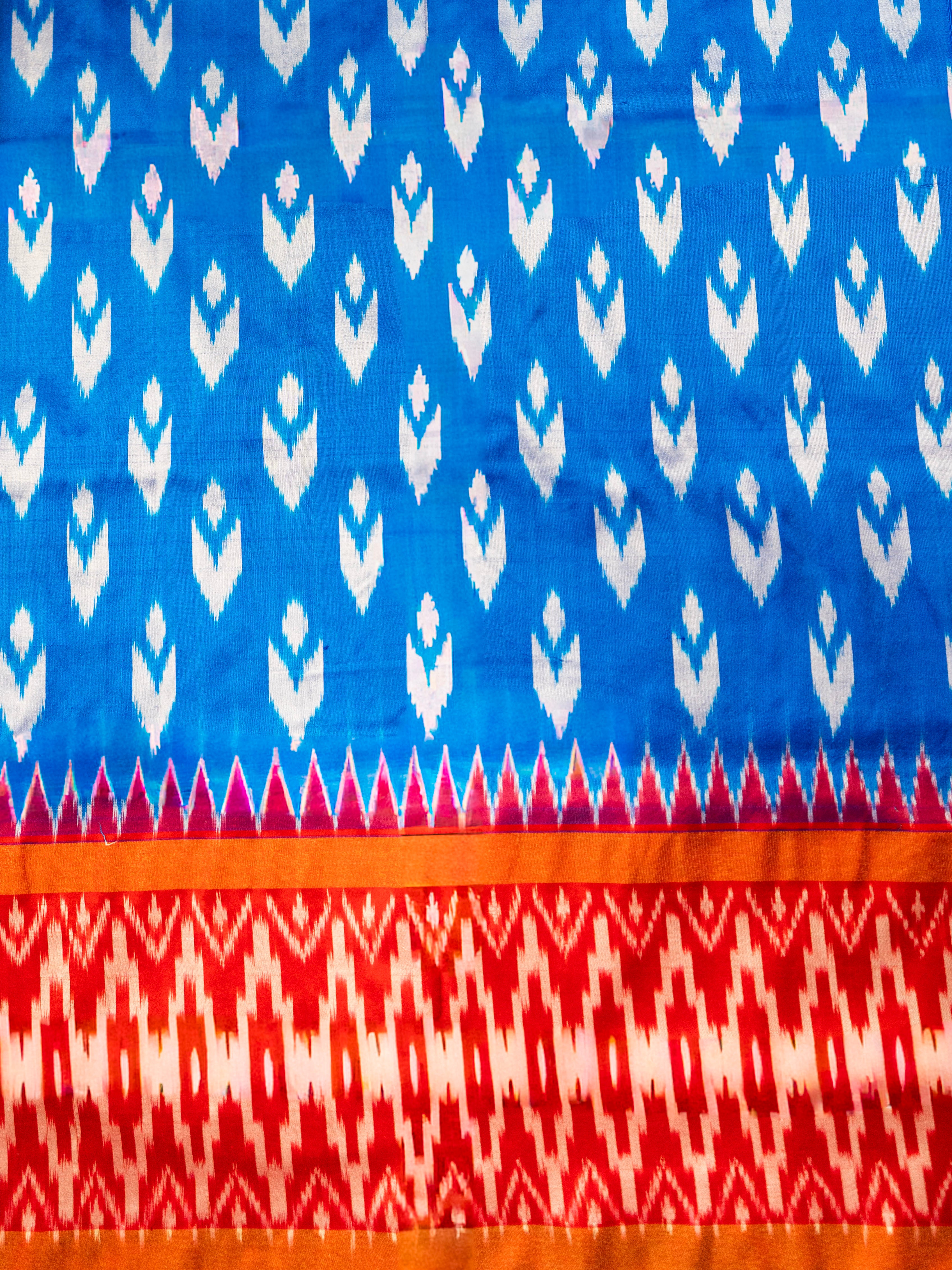 Pure Pochampally Double Ikat Blue Silk Saree with Red Ikat & Golden Zari pallu and border