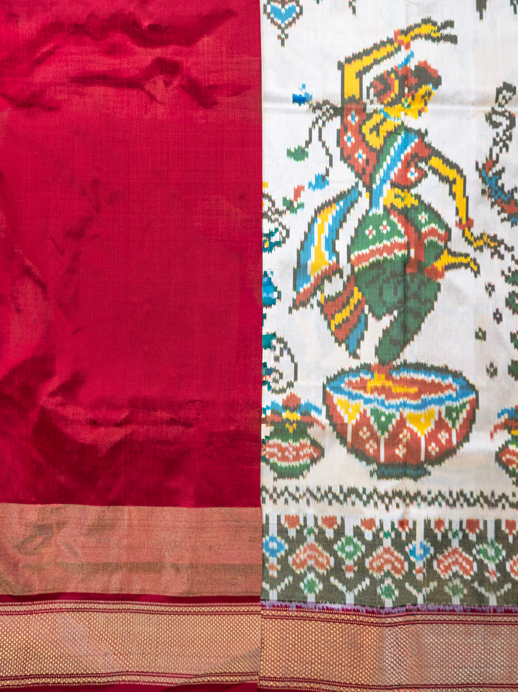 Pure Pochampally Double Ikat Silk Saree in White with Animal & Human Motifs and Red Pallu