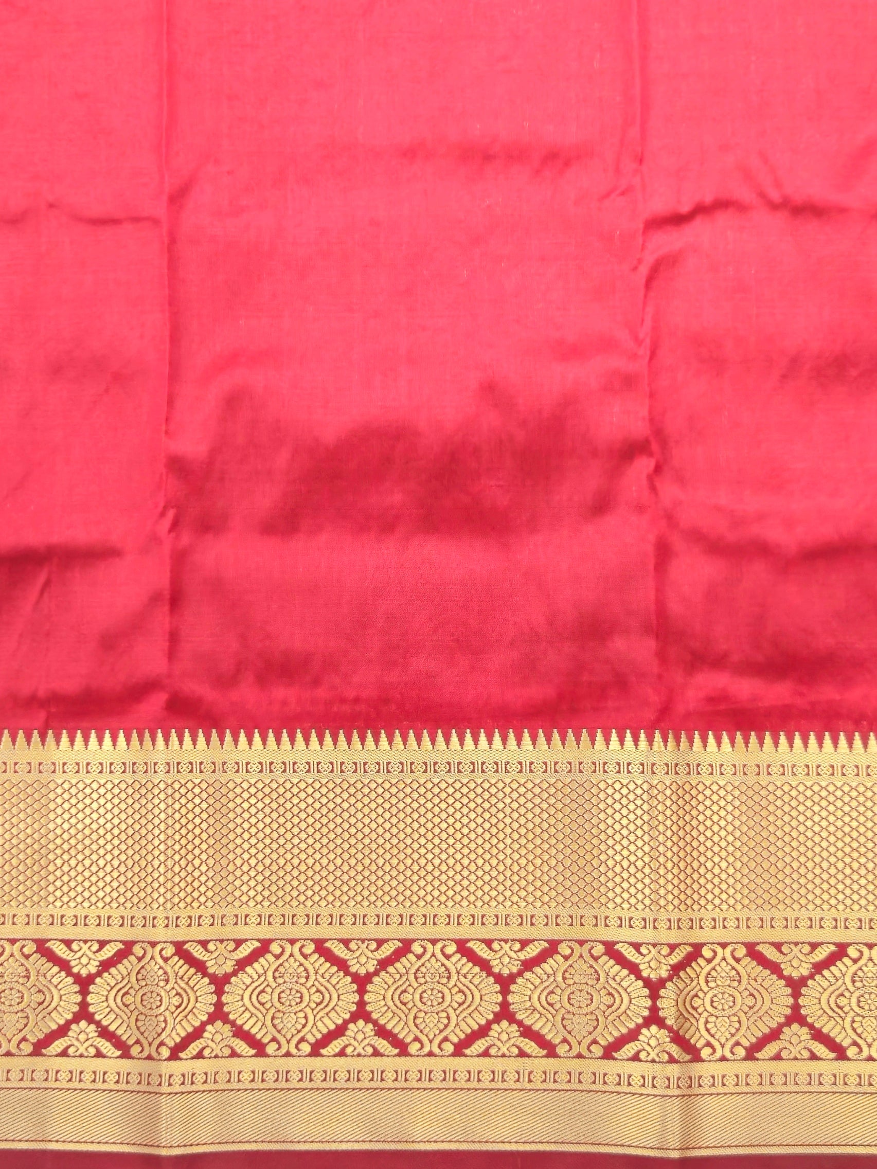 Kanchivaram silver weaving saree with gold pattu border in dark greencolor with contrast blouse