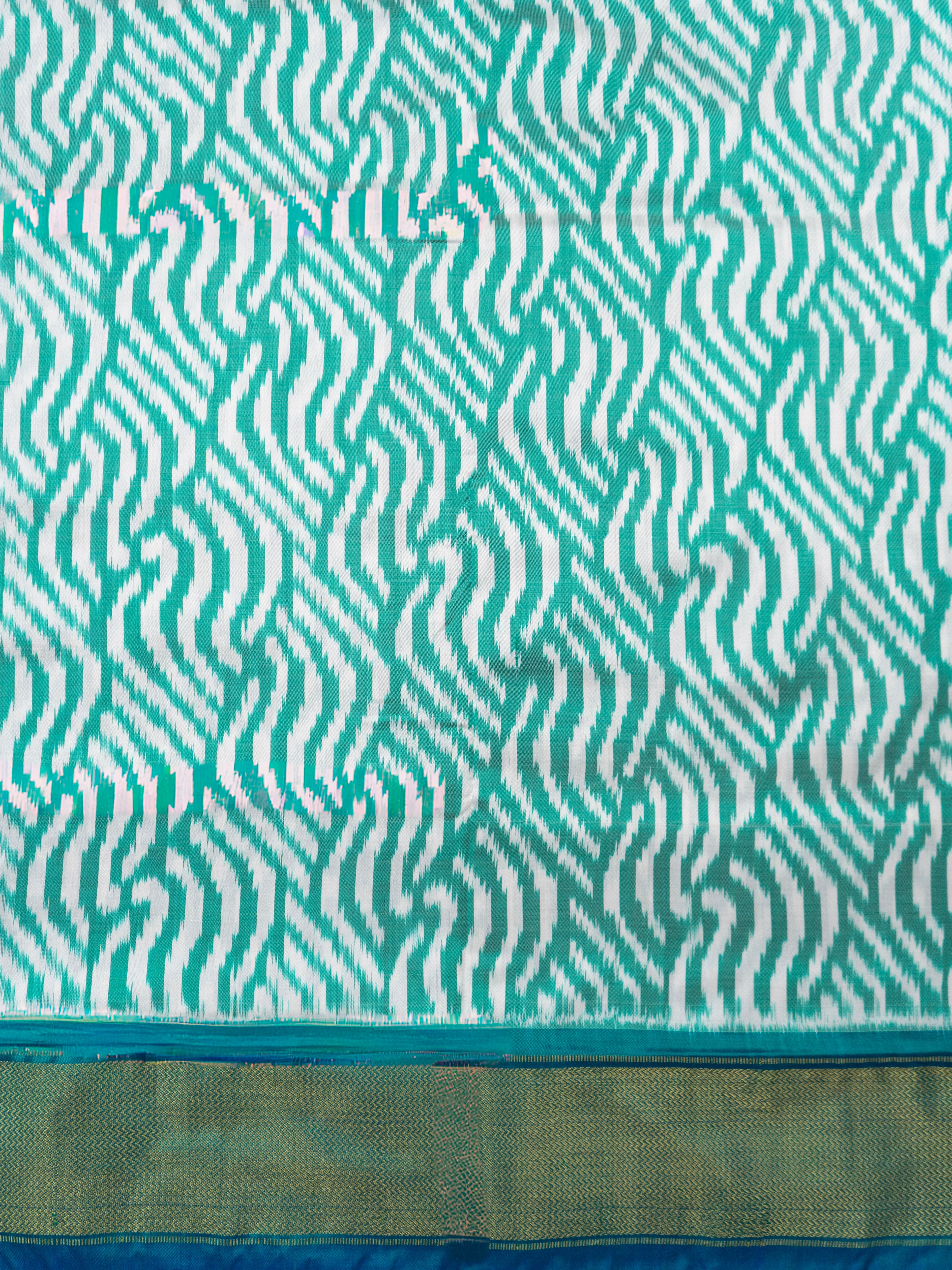 Pure Pochampally Double Ikat Silk Saree in Sea Green & White with Zari Pallu