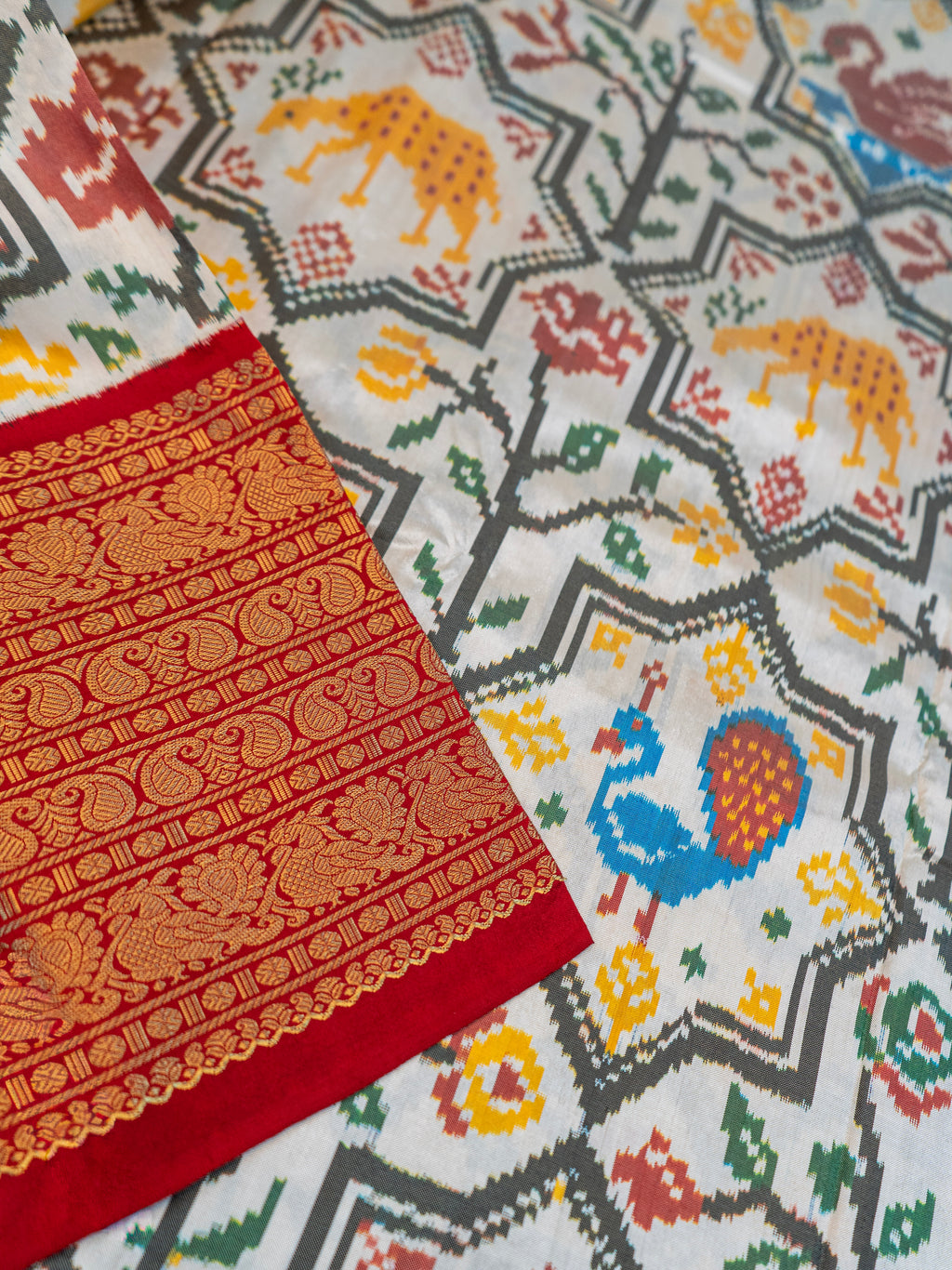 Signature Kanchipuram Pochampally Double Ikat Silk Saree in White with Red Zari Pallu
