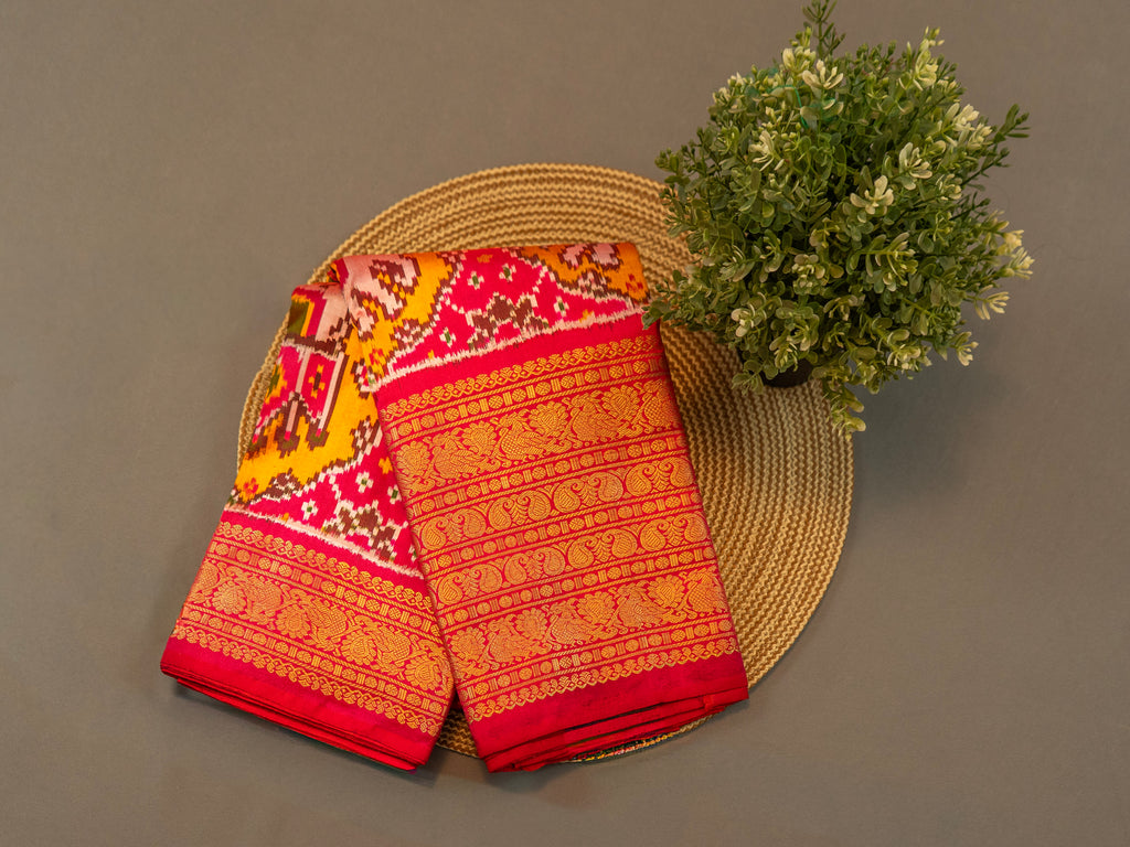 Pure Pochampally Ikat Silk Saree in Orange with Animal Motifs, Kanjivaram Border & Red Zari Pallu