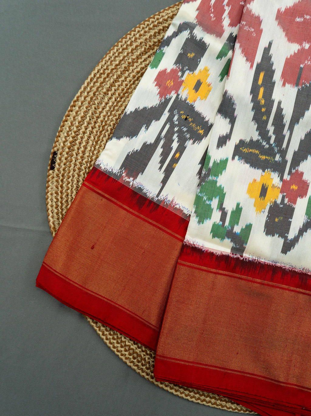 Pure Pochampally Double Ikat Silk Saree in White with Red Ikat Floral Pallu