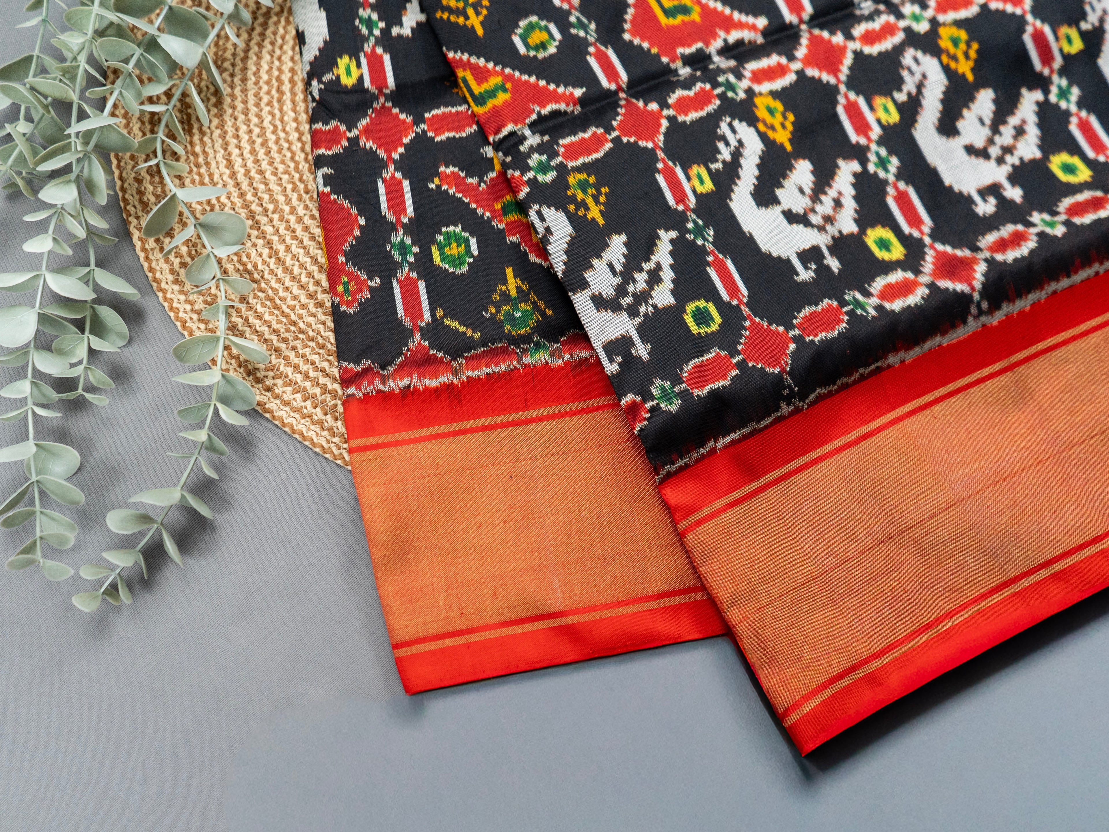 Pure Pochampally Double Ikat Silk Saree in Black with Red Ikat Pallu