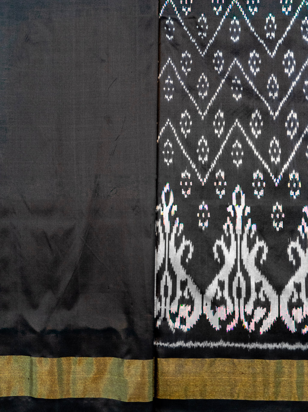 Pure Pochampally Black Silk Saree with Ikat Weaving & Golden Zari