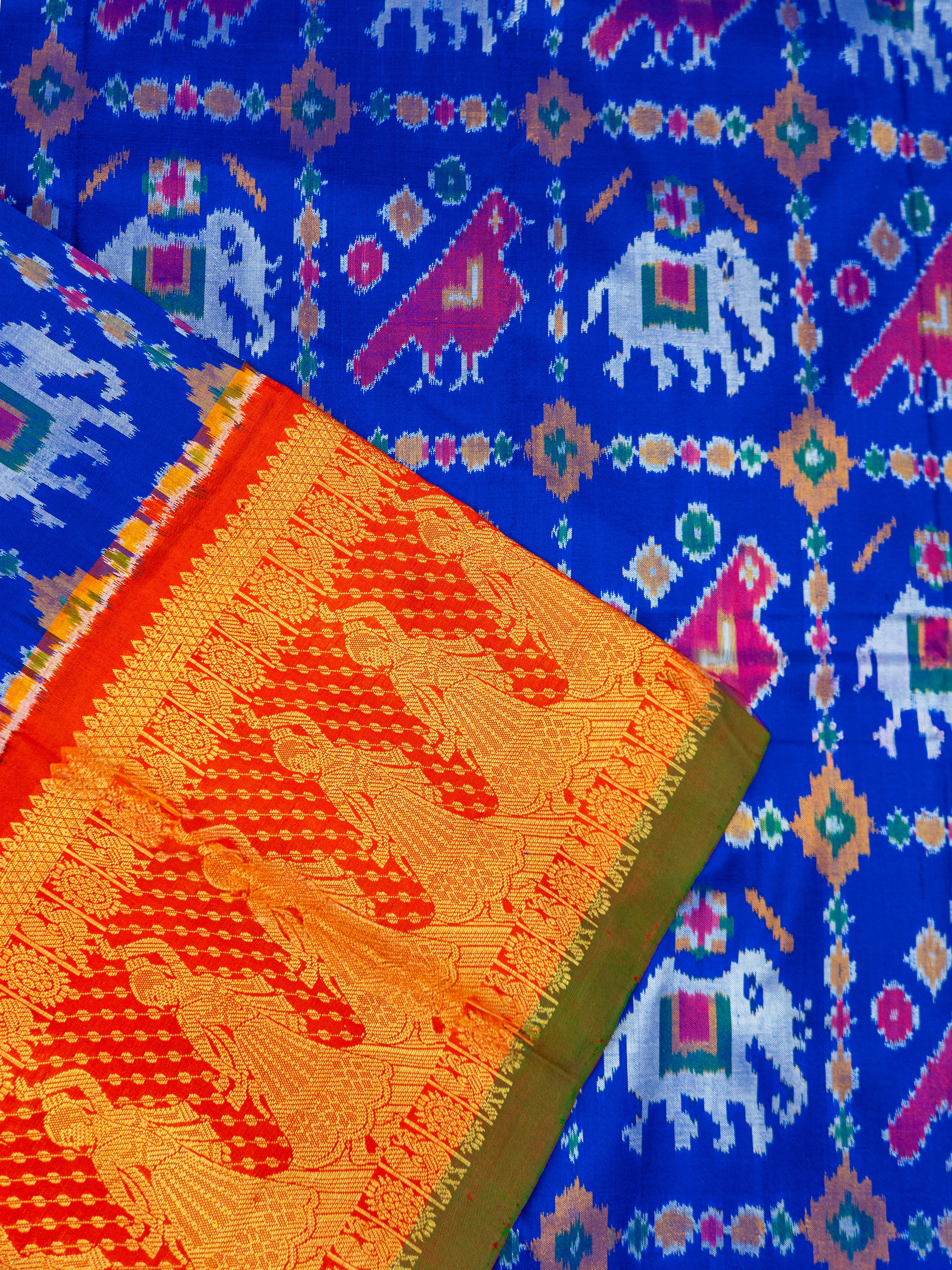 Pure Pochampally Double Ikat Kanjivaram Silk Saree in Blue with Orange Rajwada Pallu