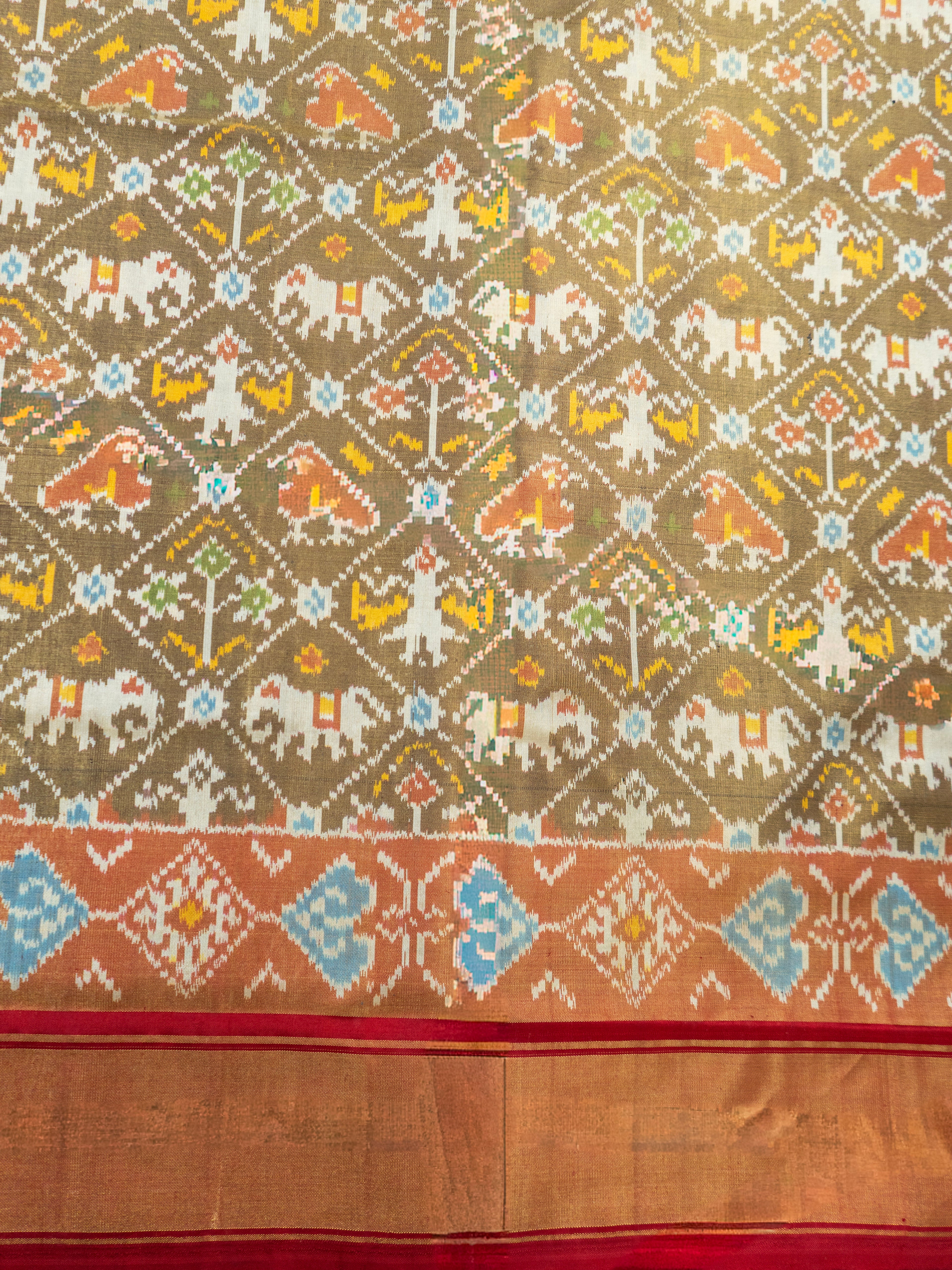 Pure Pochampally Silk Saree in Brown with Gold Zari Sparkle & Orange Ikat Pallu