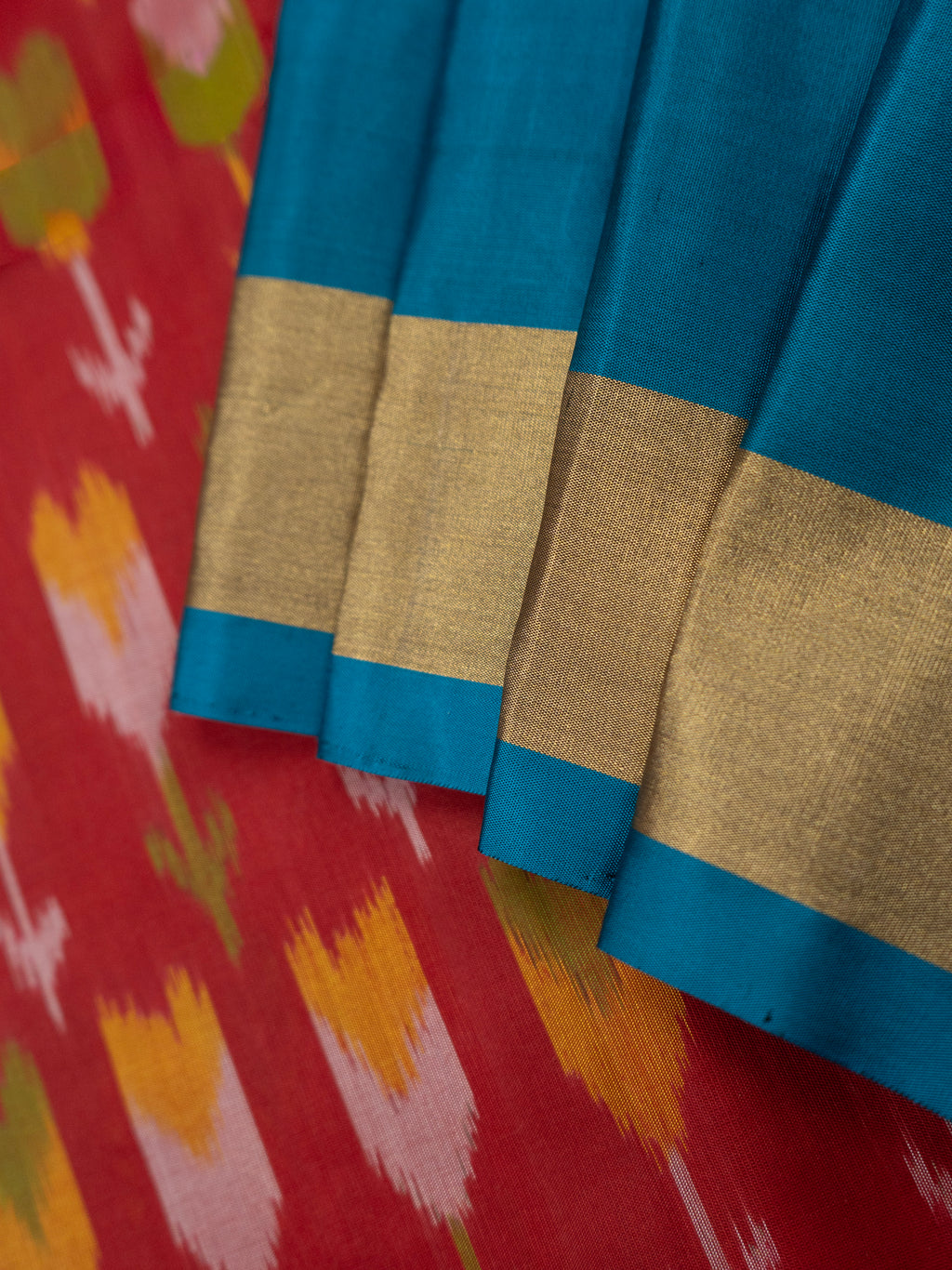 Pure Pochampally Silk Saree in Red with Lotus Ikat Weaving & Contrast Blue Ikat Pallu