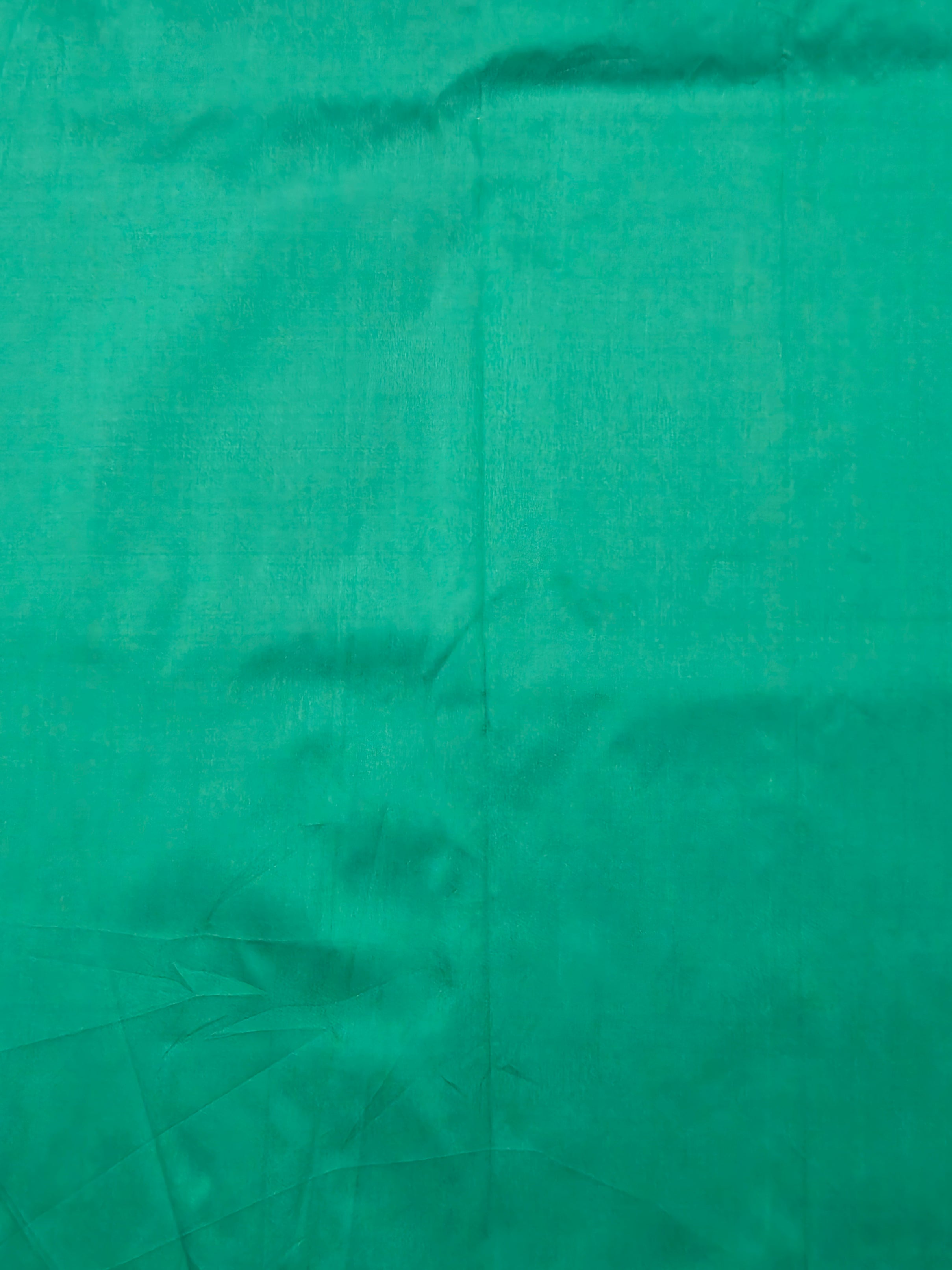 Kanchivaram gold brocrade weaving saree in dark green color with contrast plain blouse