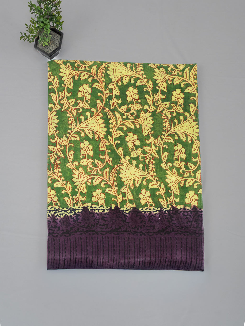 Kalamkari Print Cotton Saree in Green with Floral Design & Contrast Purple Pallu