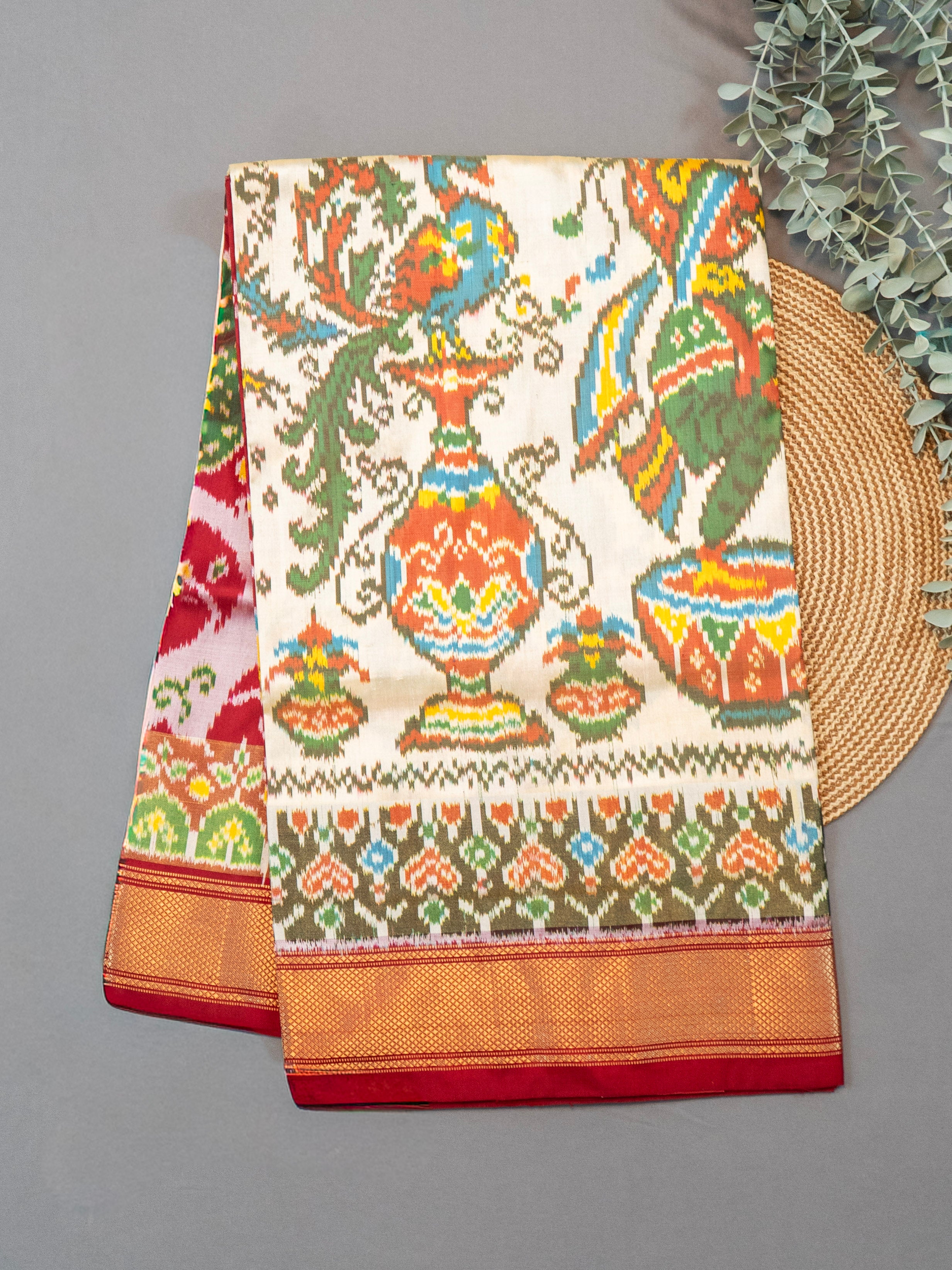 Pure Pochampally Double Ikat Silk Saree in White with Animal & Human Motifs and Red Pallu