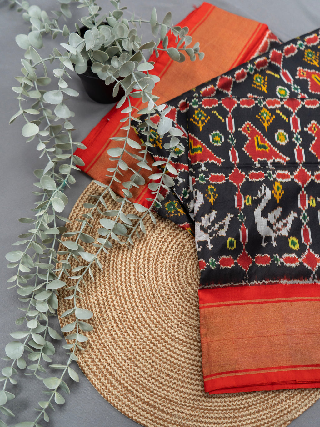 Pure Pochampally Double Ikat Silk Saree in Black with Red Ikat Pallu