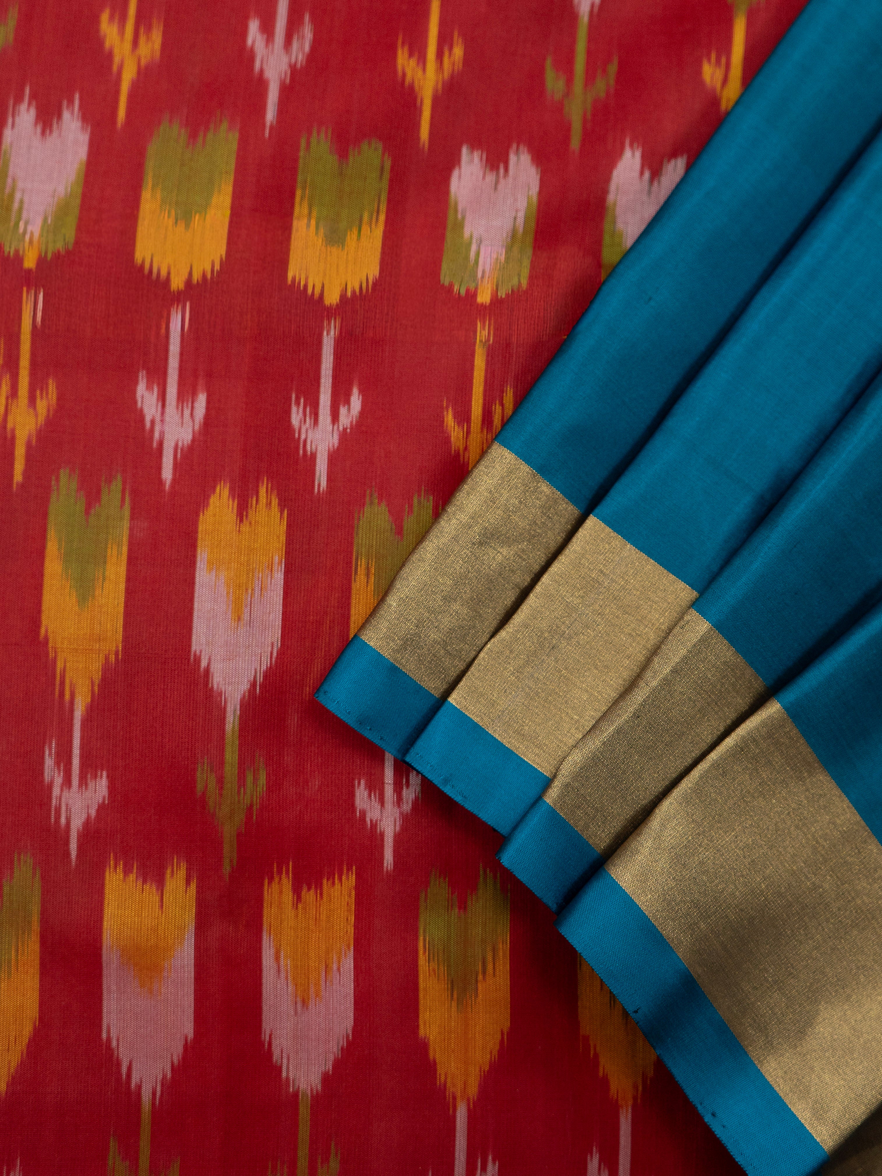 Pure Pochampally Silk Saree in Red with Lotus Ikat Weaving & Contrast Blue Ikat Pallu