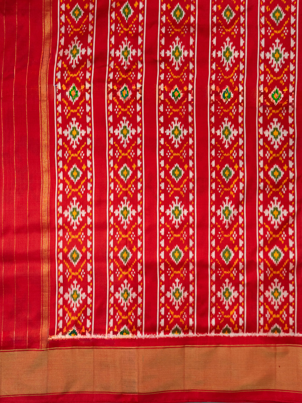 Pure Pochampally Double Ikat Silk Saree in White with Red Ikat Floral Pallu