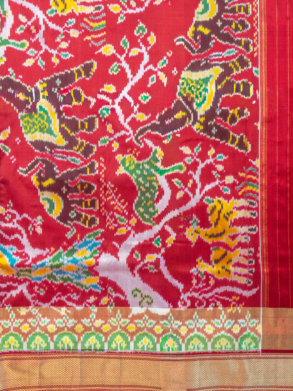 Pure Pochampally Double Ikat Silk Saree in White with Animal & Human Motifs and Red Pallu